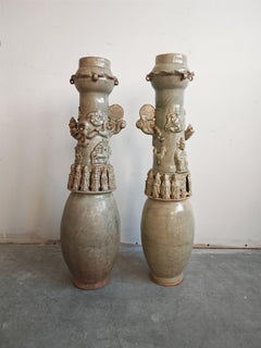 pair of Chinese Qingbai-glazed funerary urns (or vases), glazed ceramics