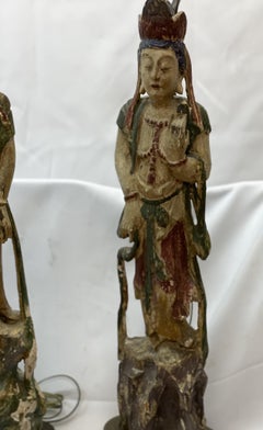 Pair of Chinese Quan Yin covered and polychromed wood table lamps 19th century