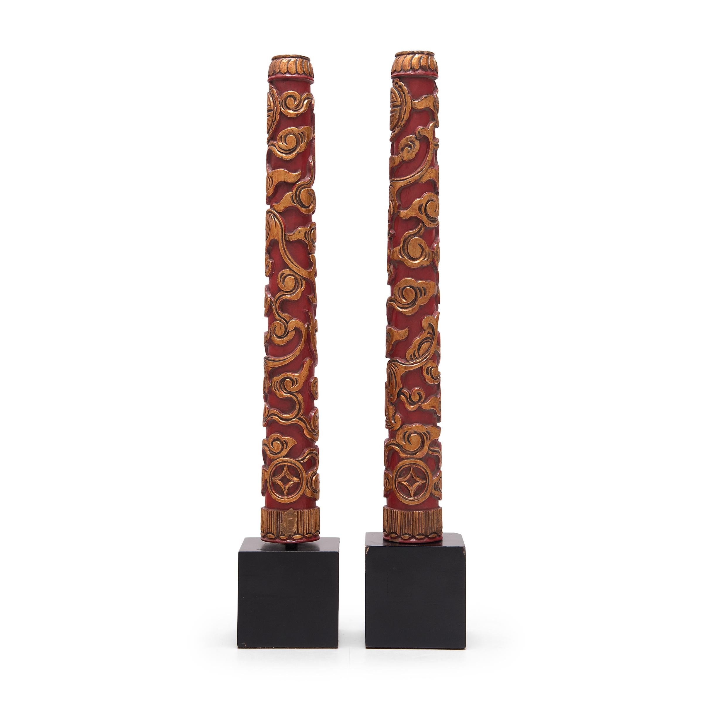 These hand-carved wooden pillars were once used to elevate burning incense in a shrine or altar display. An essential element of ritual prayer, incense is burned as a form of offering and to measure the duration of the ritual process.

These incense