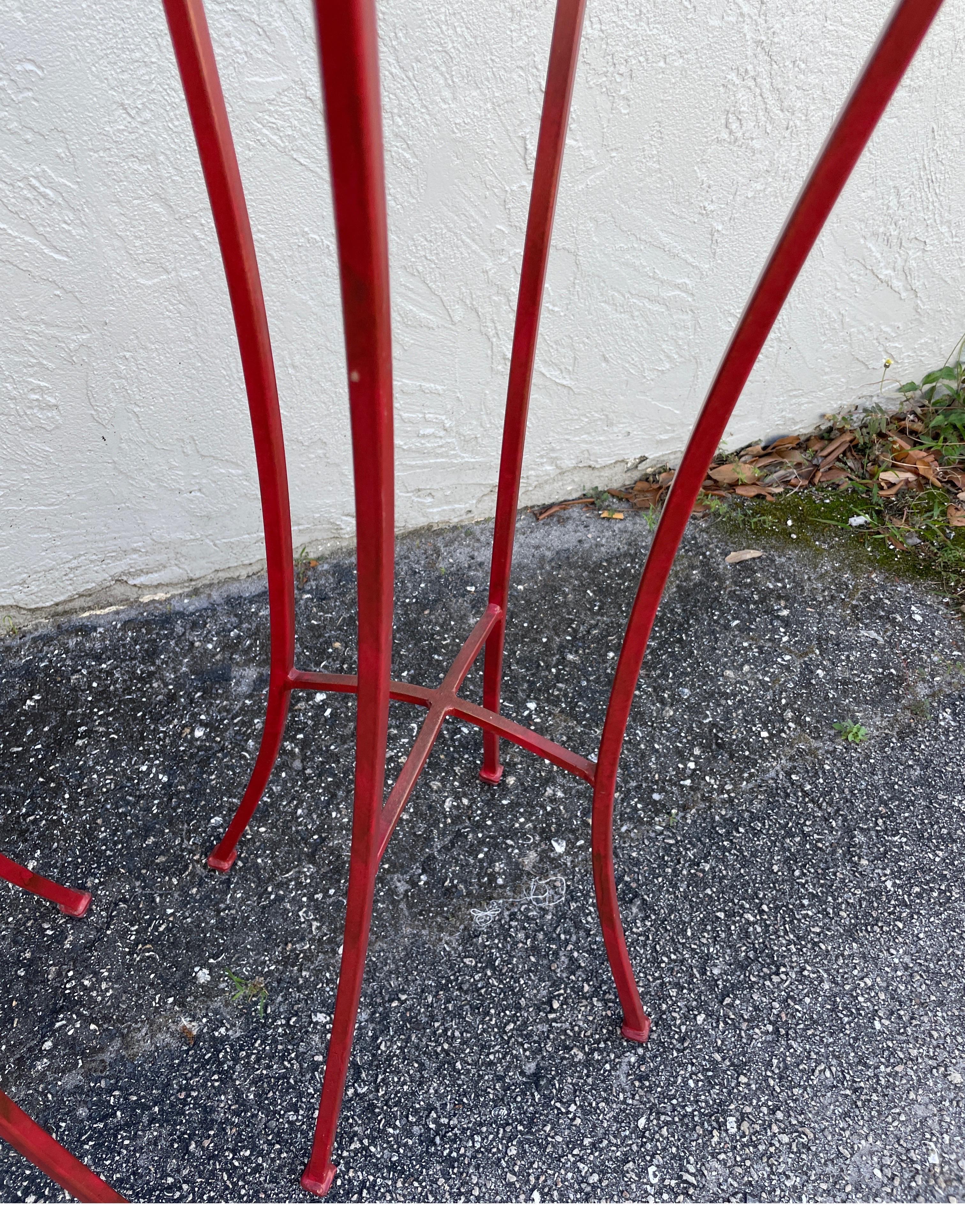 20th Century Pair of Chinese Red Glass Topped Iron Stands For Sale