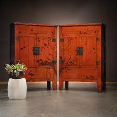 Pair of Chinese Red Lacquer Cabinets with Birds in Flight, c. 1850