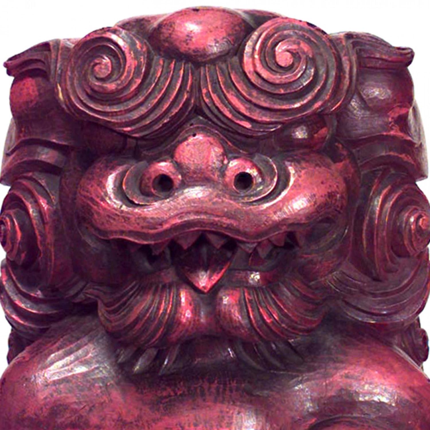 Intagliato Pair of Chinese Red Lacquered Foo Dogs in vendita