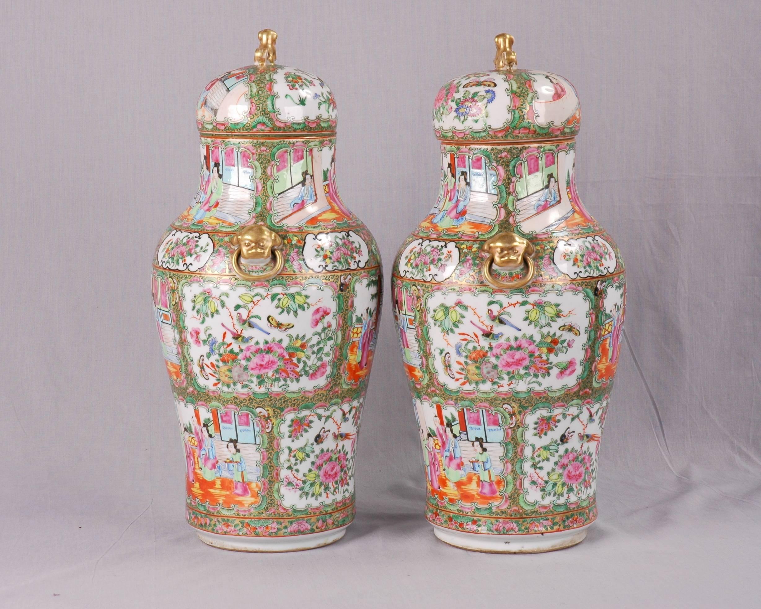 Pair of rose medallion covered vases, China, 19th century.
Chinese export porcelain vases feature domed lids with foo
fog finials and ring handles applied at the shoulder.