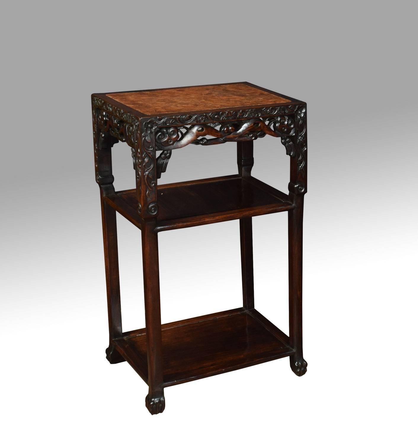 Pair of Chinese rosewood and marble urn stands, the rectangular tops inset with a panel of variegated marble, above pierced and carved freeze all raised up on tapering legs with carved feet united by under tiers.

Dimensions:
Height 31.5