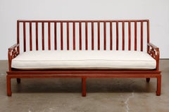 Coppia di divani o panche cinesi intagliati in palissandro