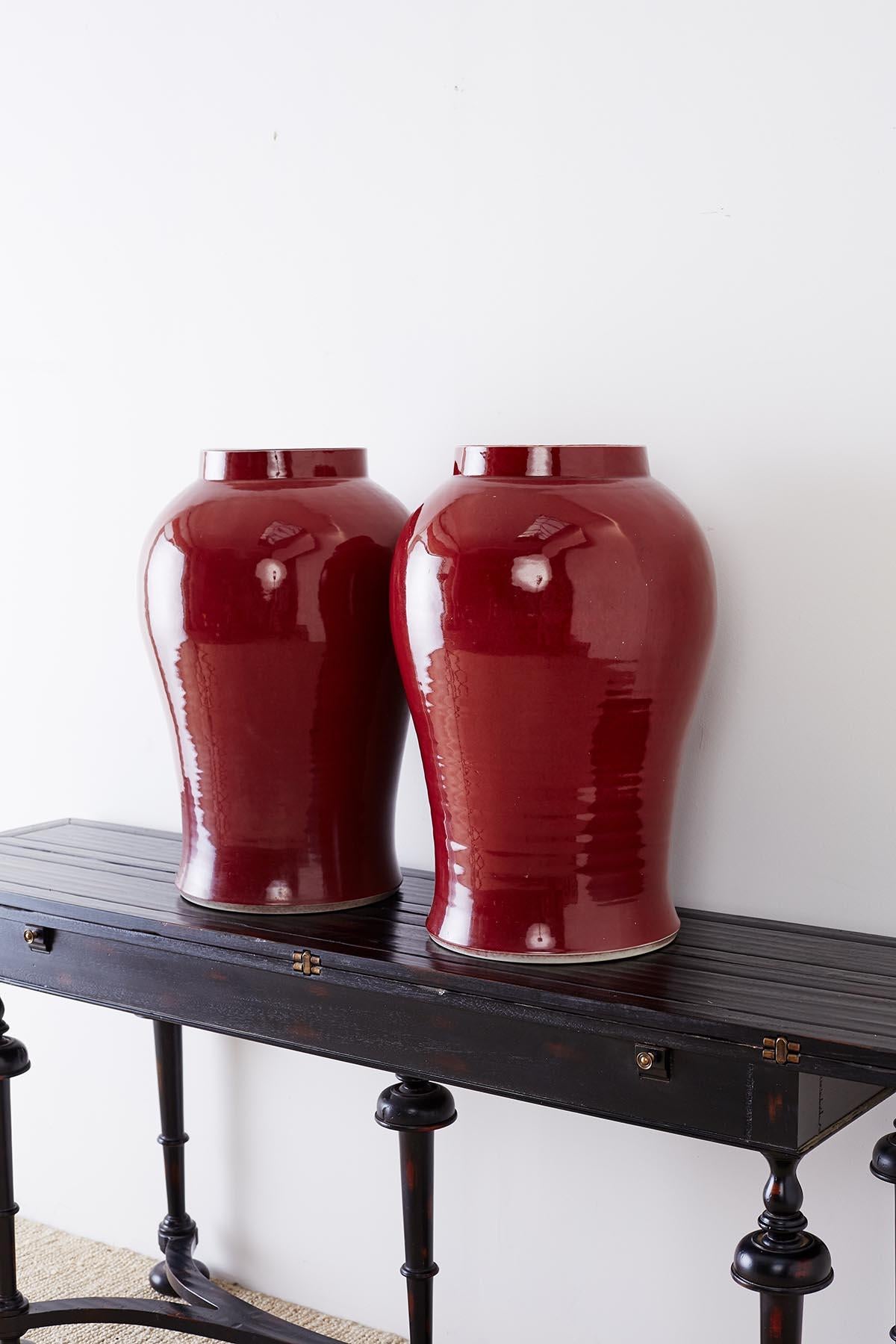 Porcelain Pair of Chinese Sang de Boeuf Glazed Oxblood Vases