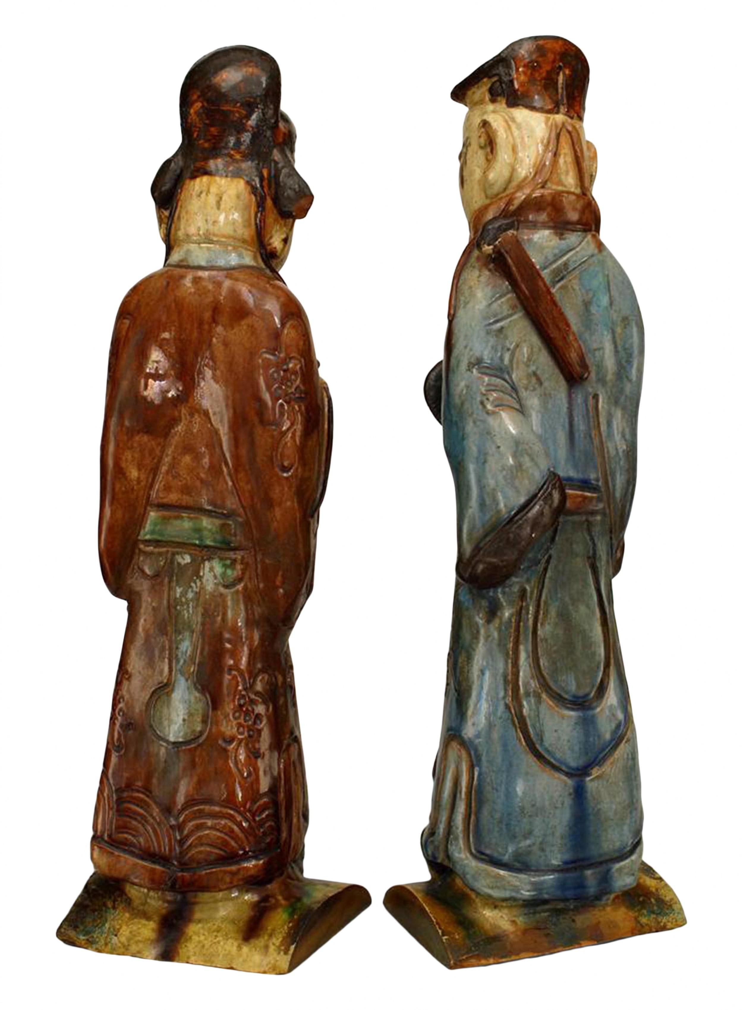 Asian Pair of Chinese Shekwan pottery roof ornament male figures  For Sale