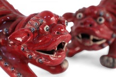 Pair of Chinese Shiwan Guangdong Red Porcelain Foo Dogs