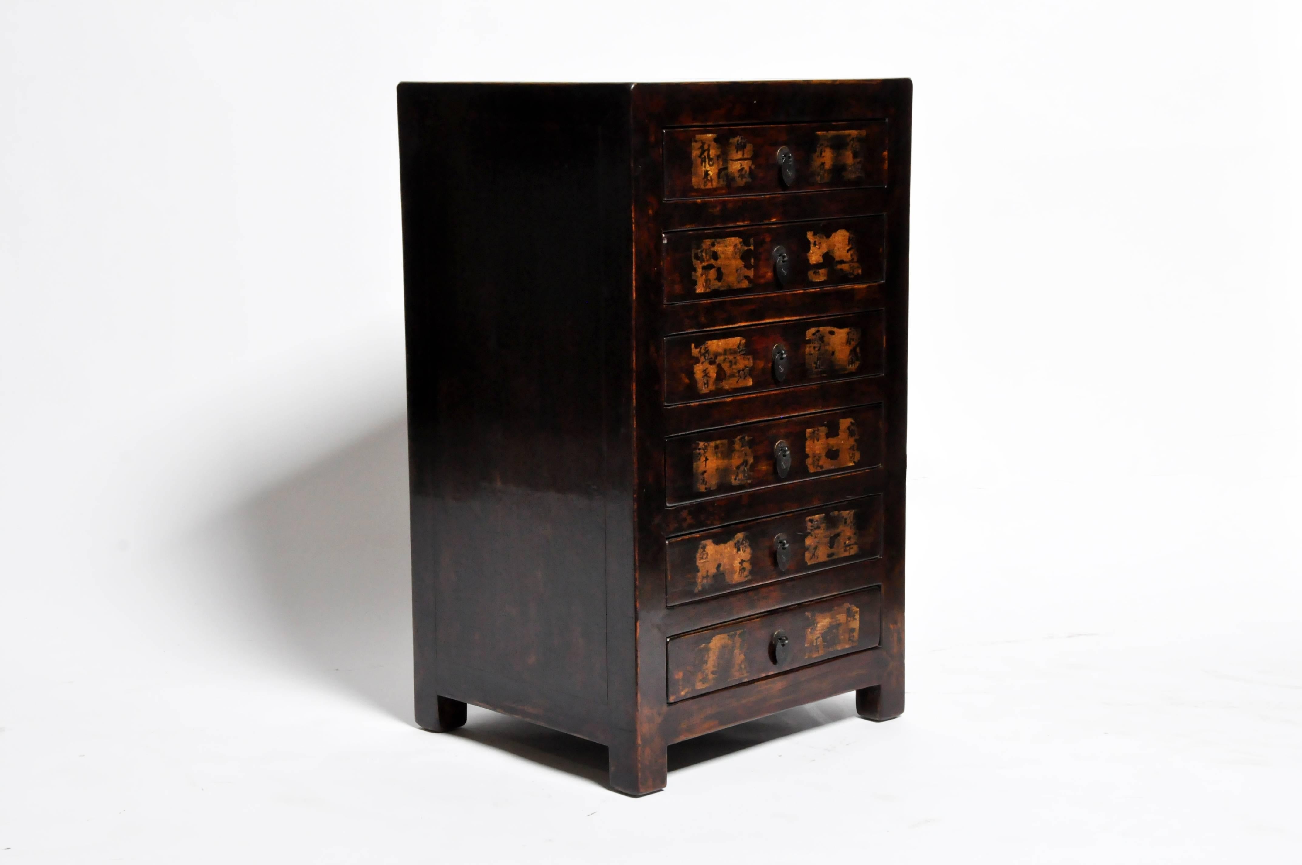 This pair of side chests are from Henan, China and were made from reclaimed cypress wood. Each chest has six drawers with Chinese characters describing their original contents. The chests features mortise and tenon joinery and you can also customize