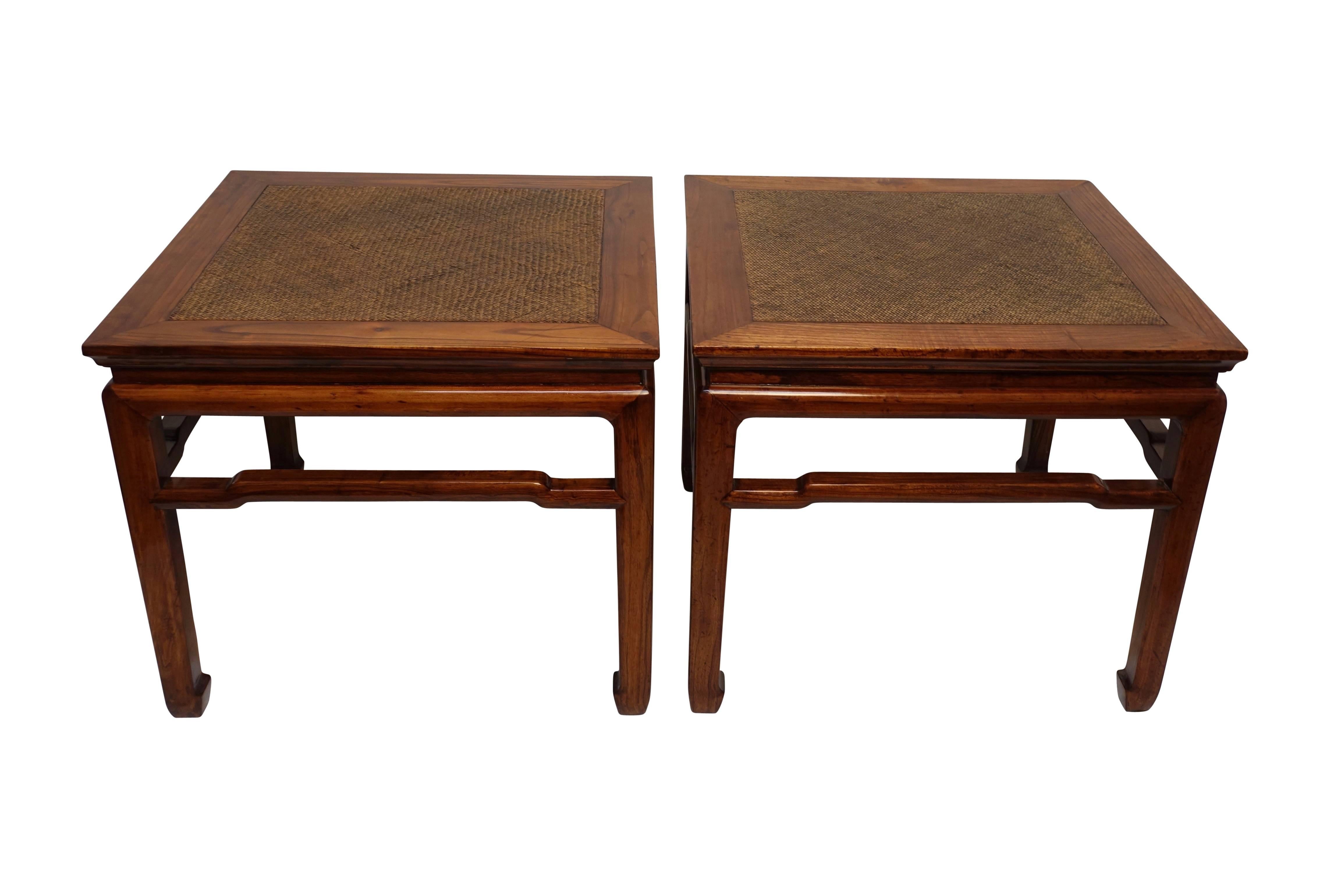 A pair of end or side tables with inset woven panel top surface. China, Qing dynasty, mid-19th century.
