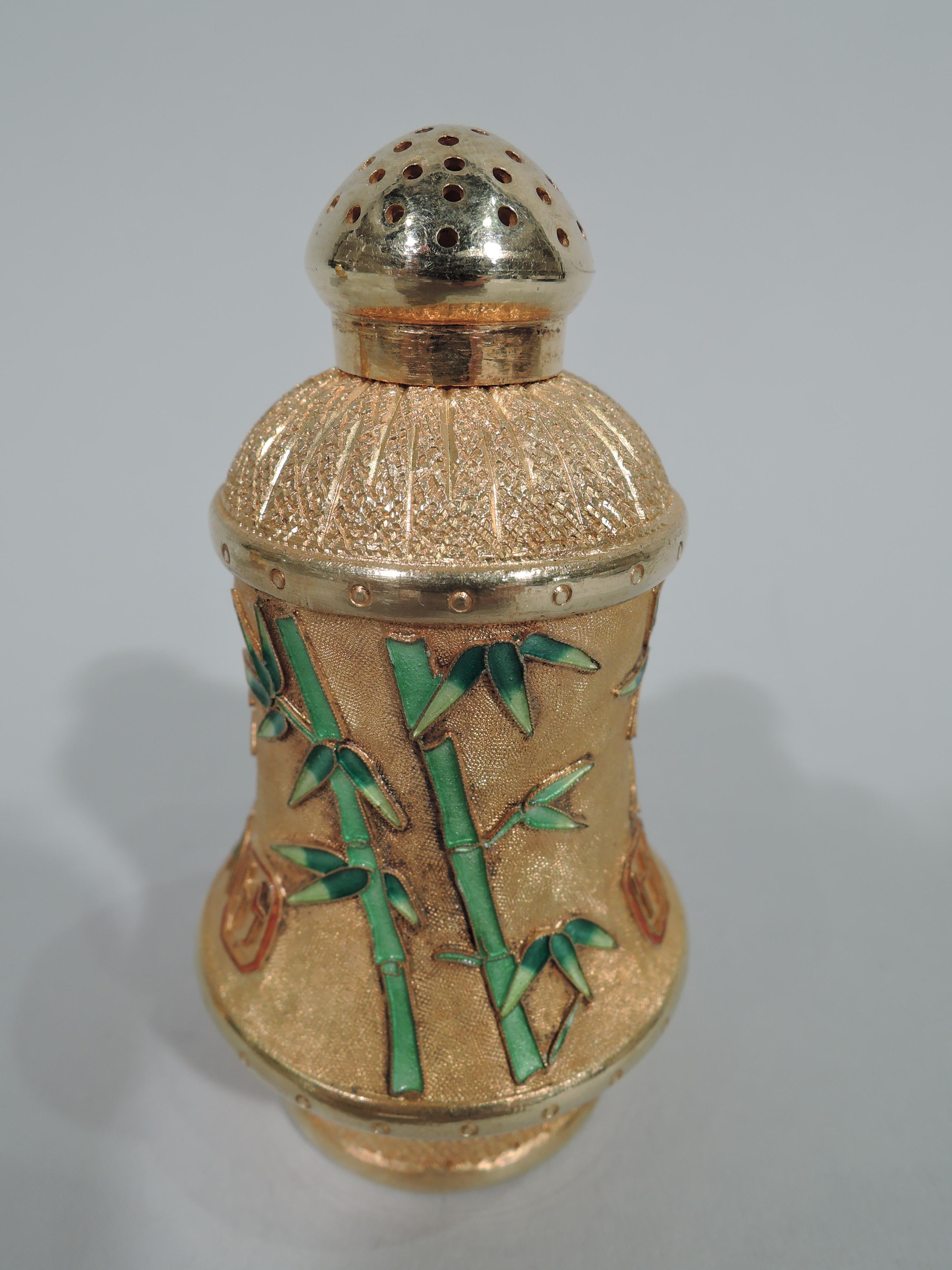 Pair of Chinese export silver gilt and enamel salt and pepper shakers. Baluster with enameled bamboo and characters on stippled ground. Gilt and pierced domed, and threaded ball cover. Lots of period flavor. Marked “Silver”. Total gross weight: 3.8