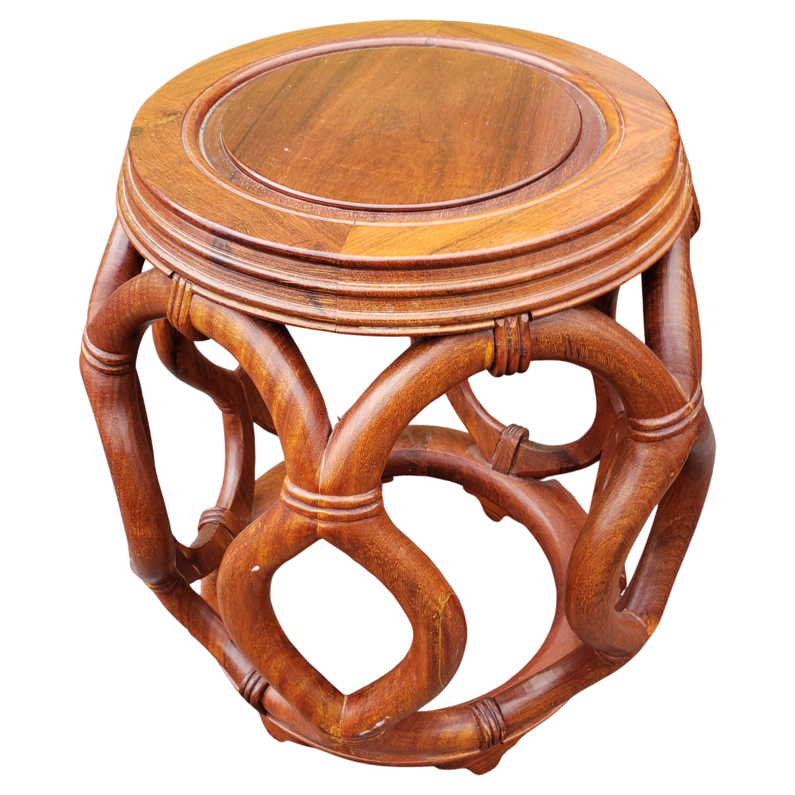 An exquisite Pair of Chinese solid Rosewood hand crafted, hand carved Faux Rattan / vine Garden Style Stools or Side Tables in great vintage condition. May be used as side tables or as stools with a perfect seat high of 18