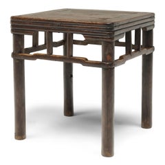 Pair of Chinese Stacked Stretcher Walnut Stools, c. 1850