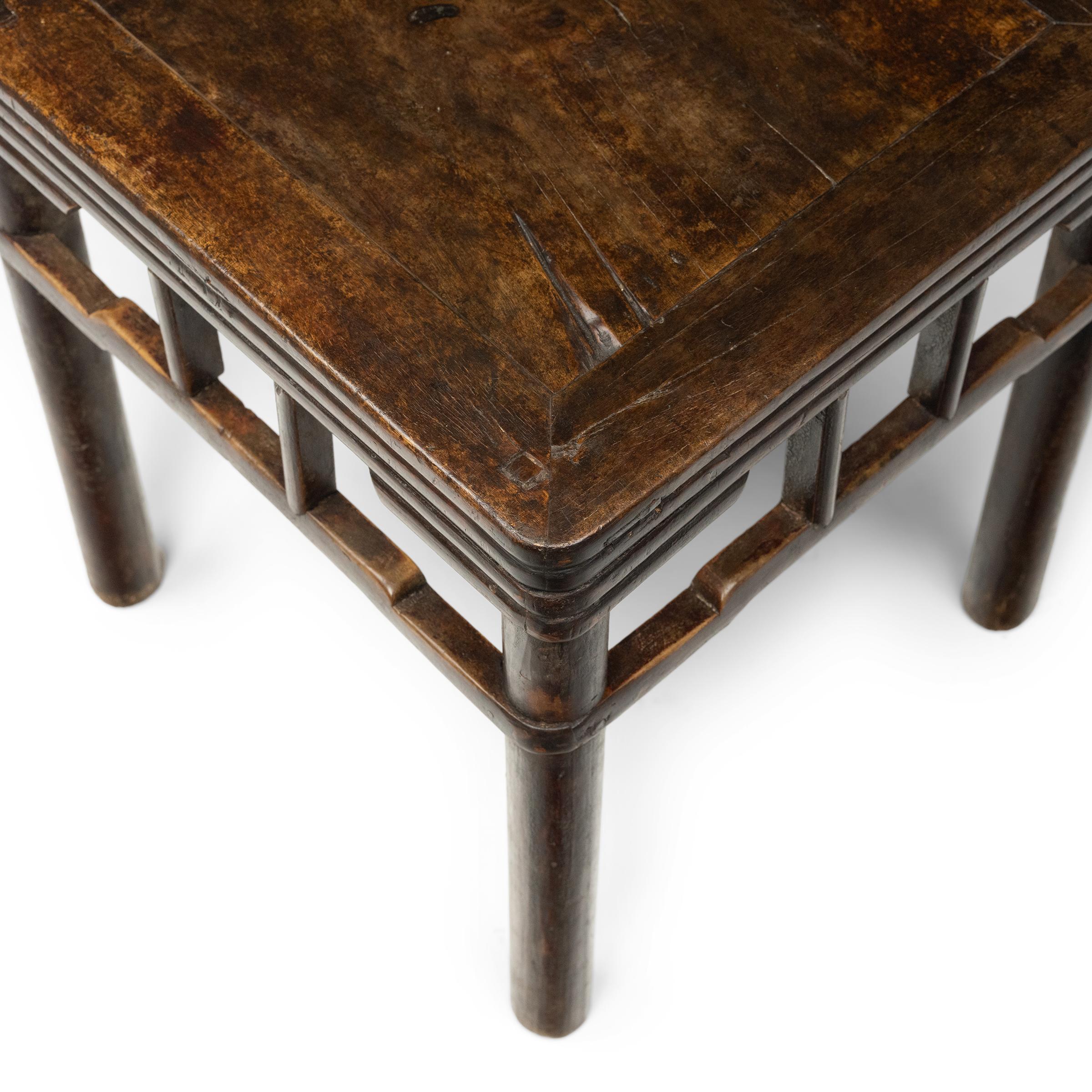 Pair of Chinese Stacked Stretcher Walnut Stools, c. 1850 In Good Condition For Sale In Chicago, IL