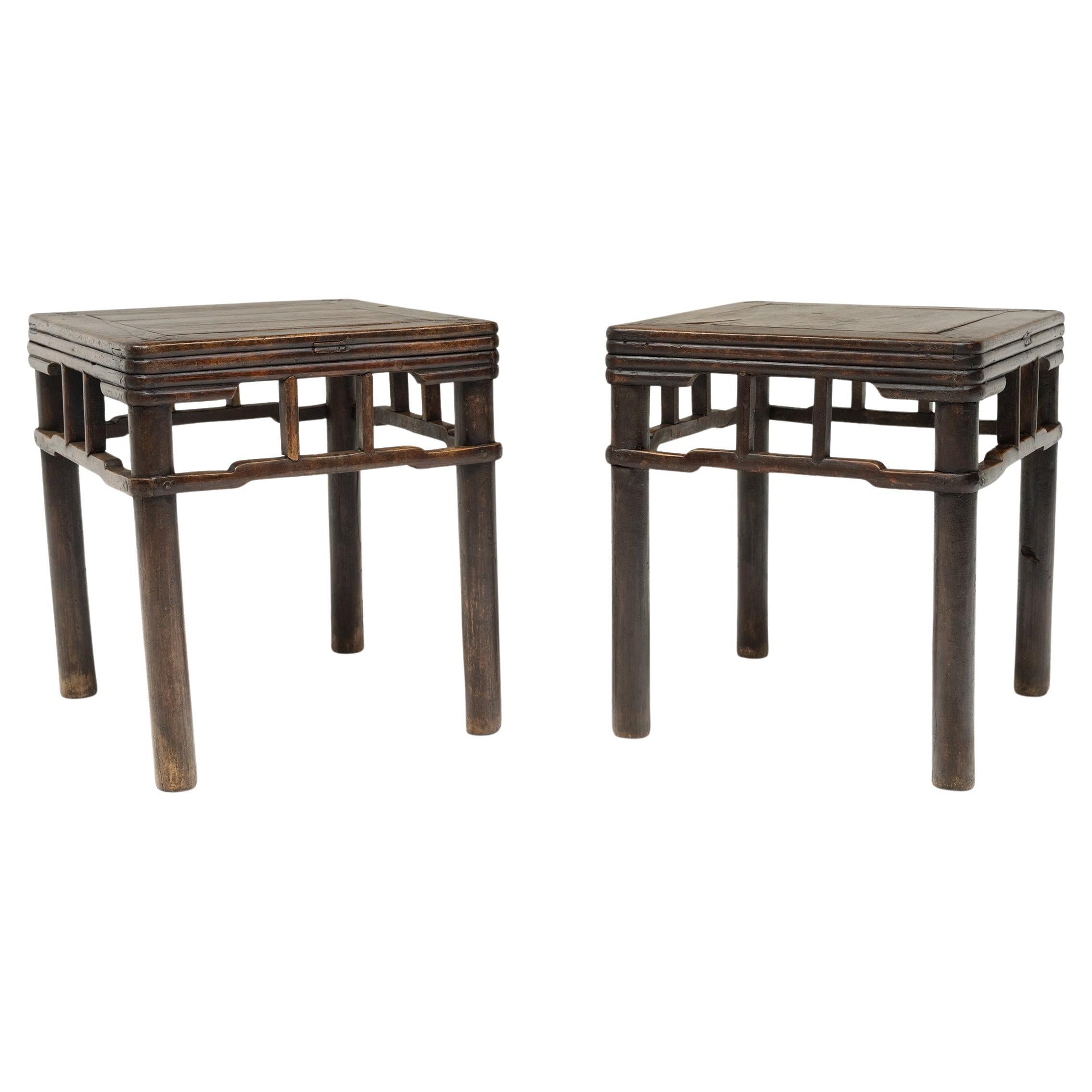 Pair of Chinese Stacked Stretcher Walnut Stools, c. 1850