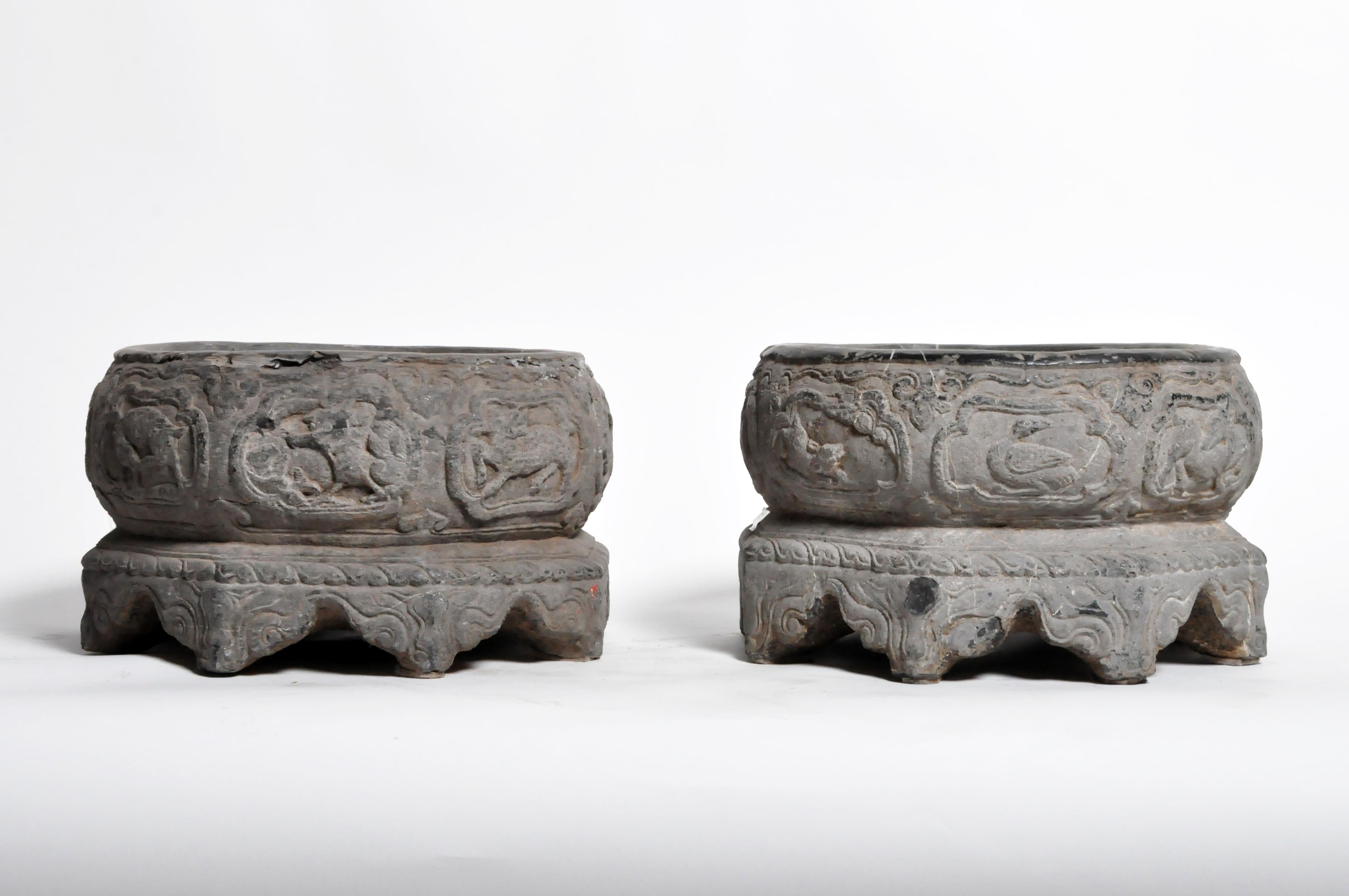 This impressive pair of basins are from Shanxi Province, China, and was made from stone, circa 18th century. Wear consistent with age and use. Price for the pair.
  