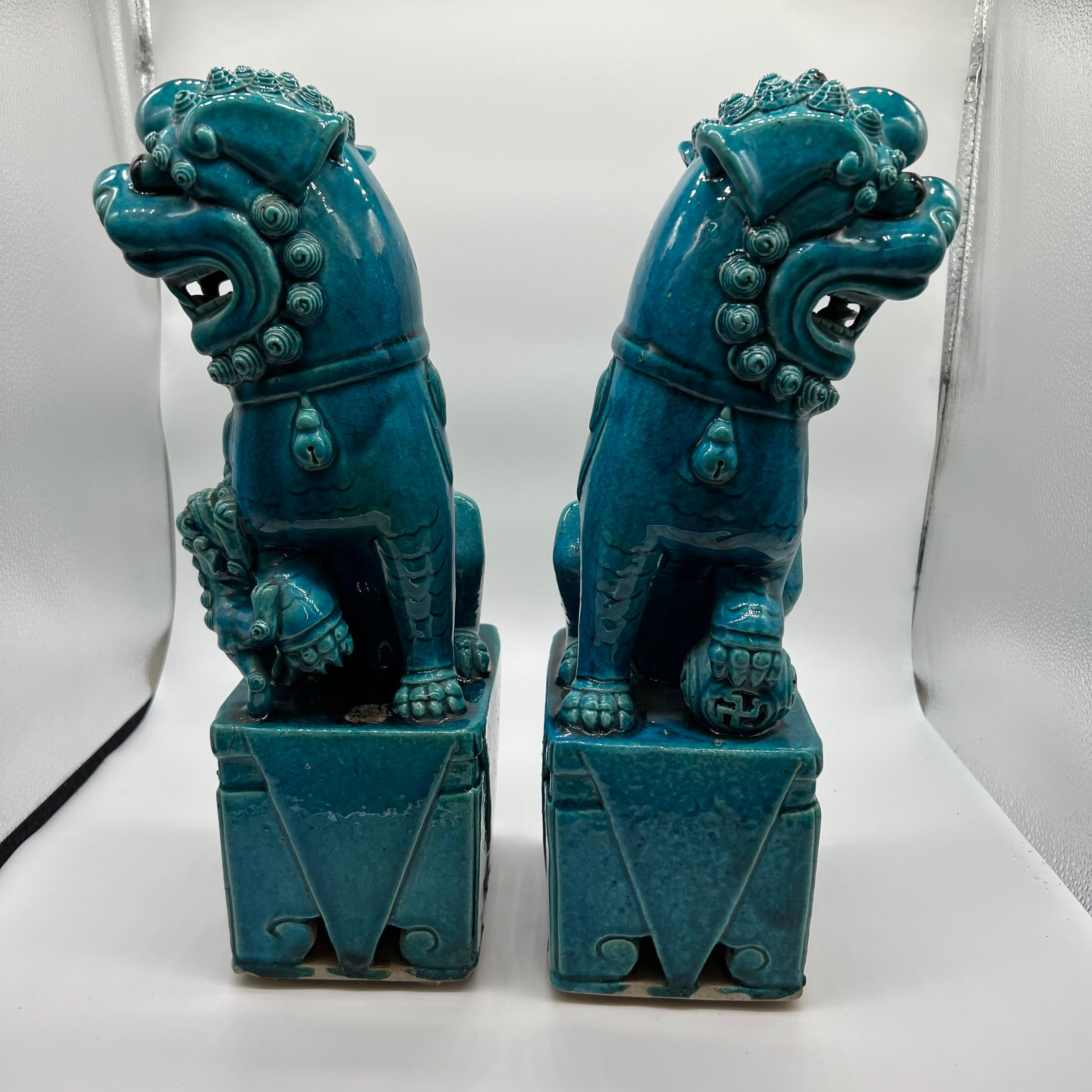Qing Pair of Chinese Turquoise Glazed Foo Dogs, circa 1880 For Sale