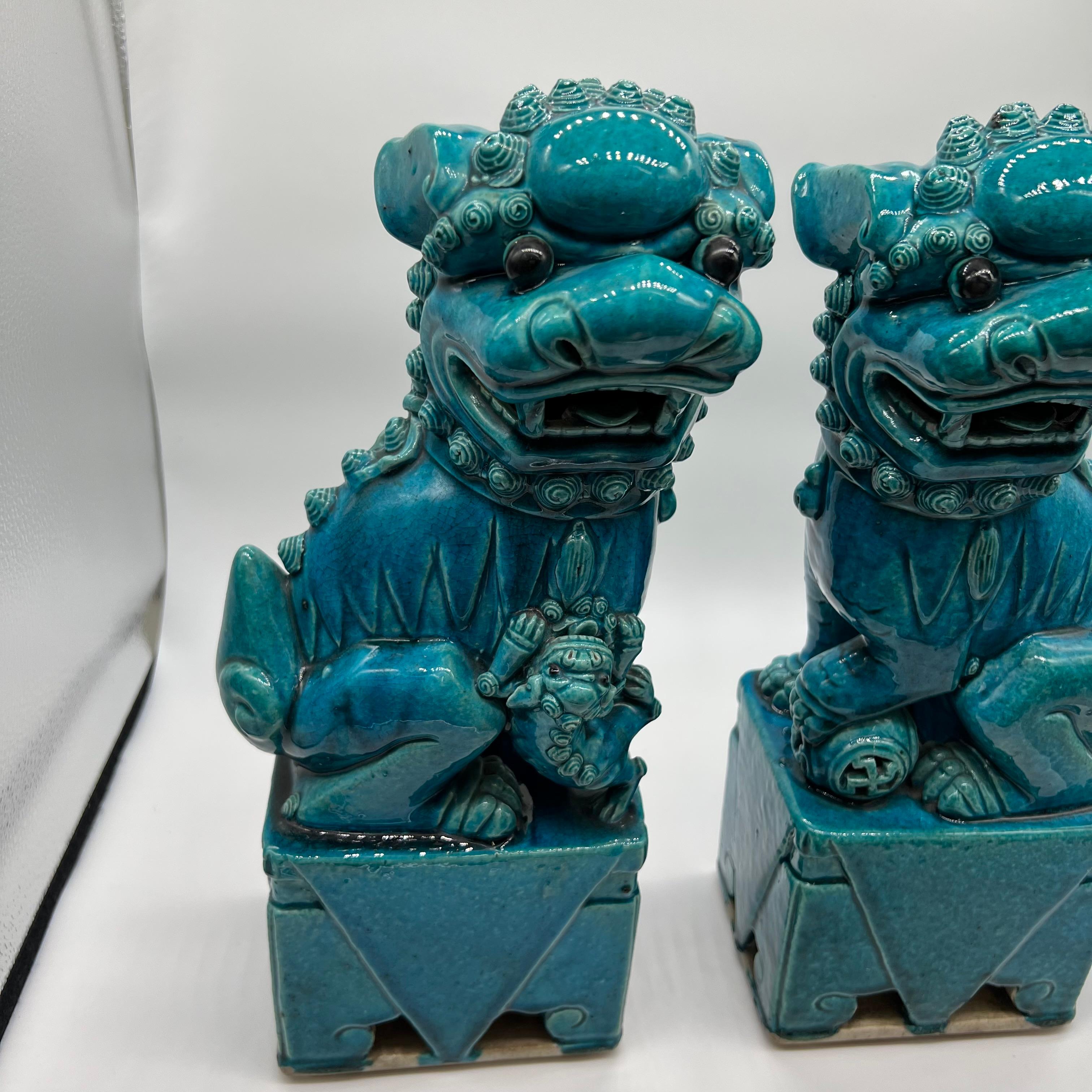 Ceramic Pair of Chinese Turquoise Glazed Foo Dogs, circa 1880 For Sale