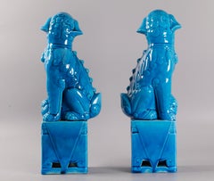 pair of Chinese turquoise glazed porcelain foo lions/dogs