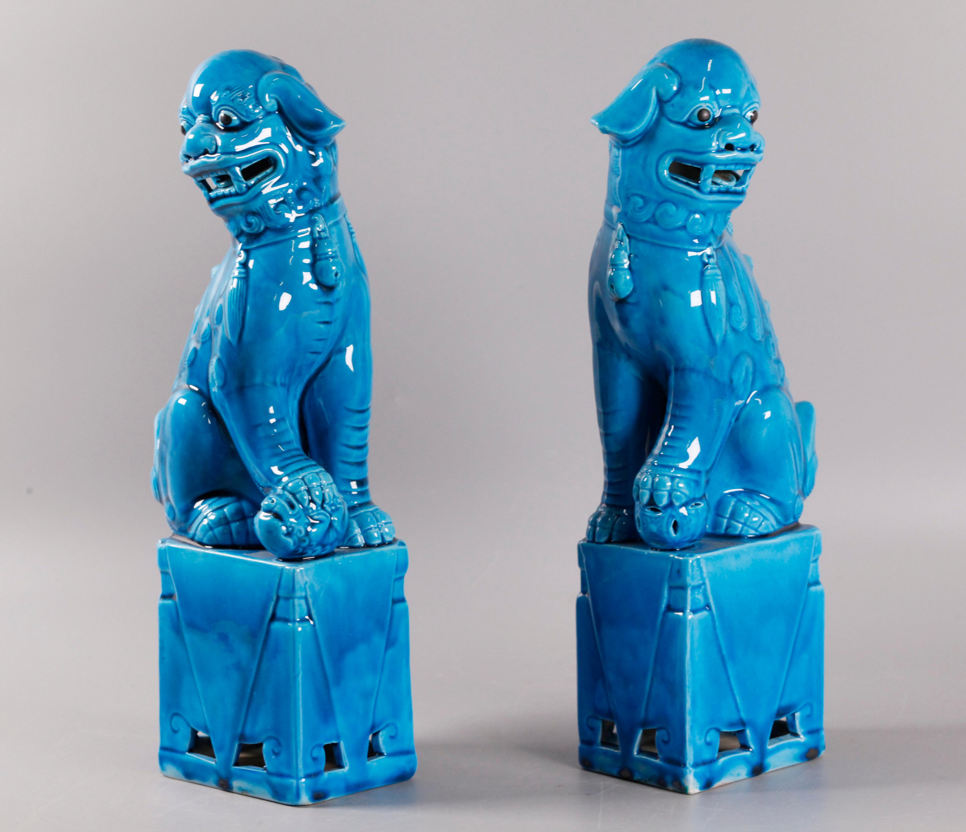 20th Century pair of Chinese turquoise glazed porcelain foo lions/dogs For Sale