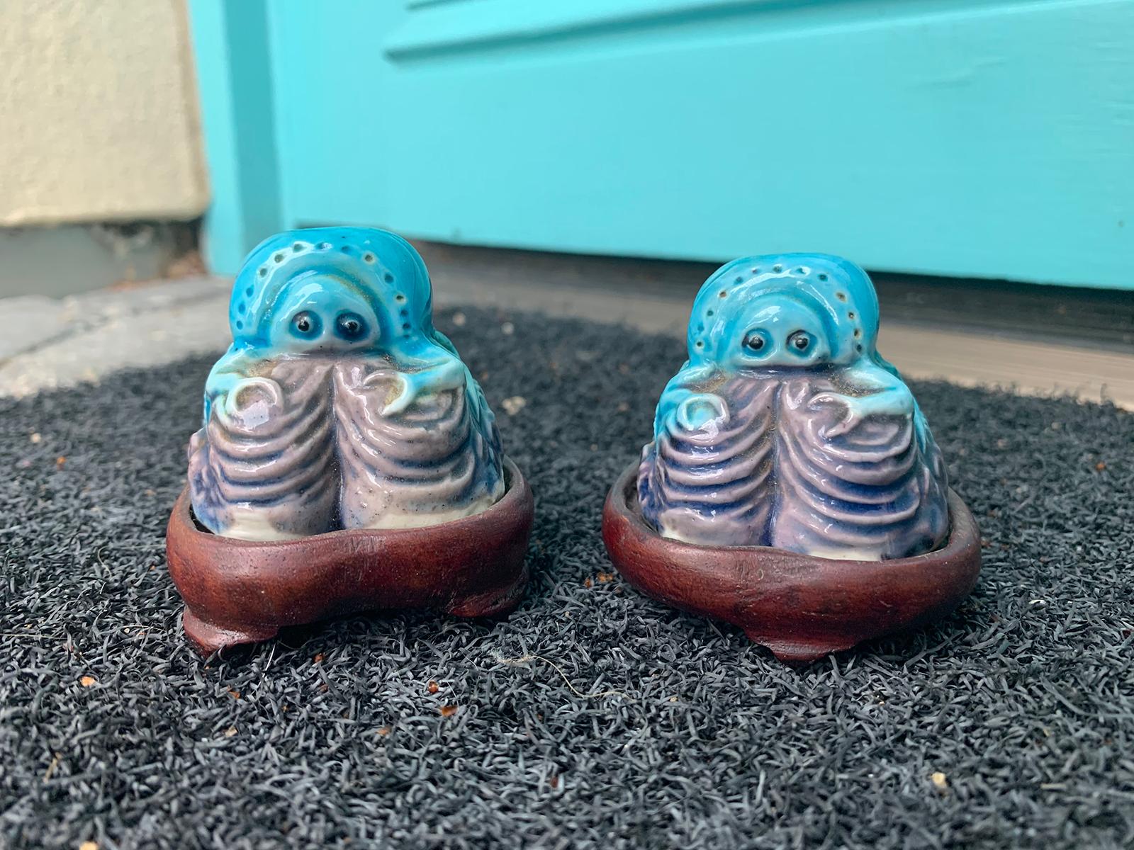 Pair of 19th-20th century Chinese turquoise blue and purple glazed porcelain crabs on wooden stands, marked China and has old 