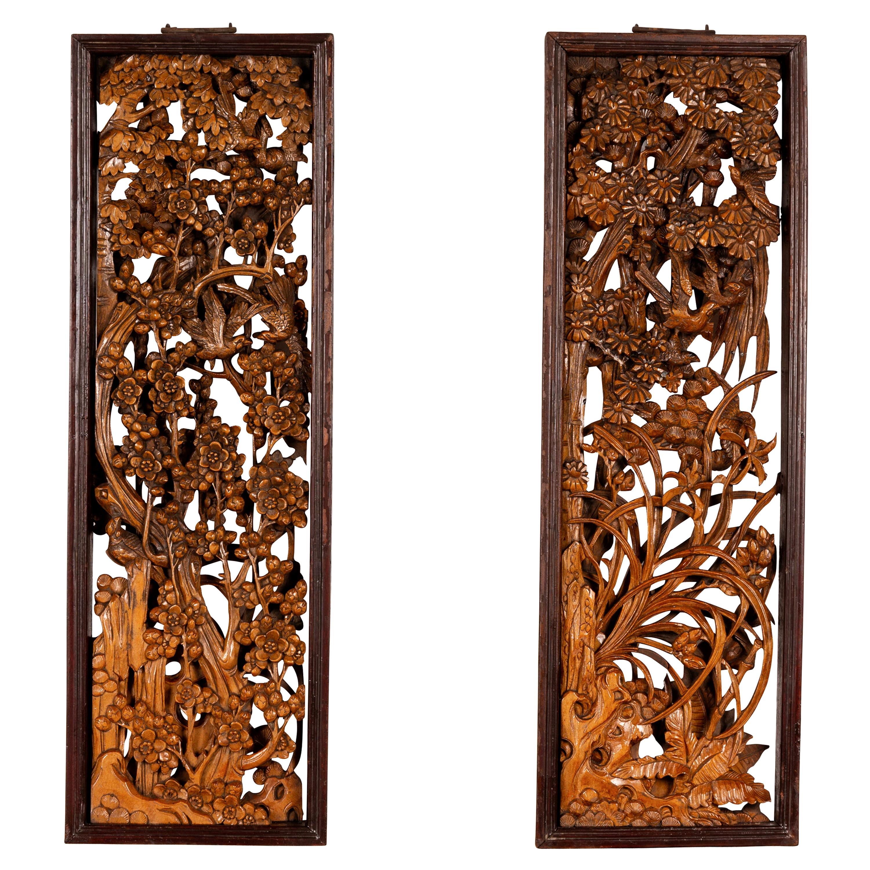 Pair of Chinese Vintage Carved Elmwood Wall Panels with Birds and Foliage Motifs