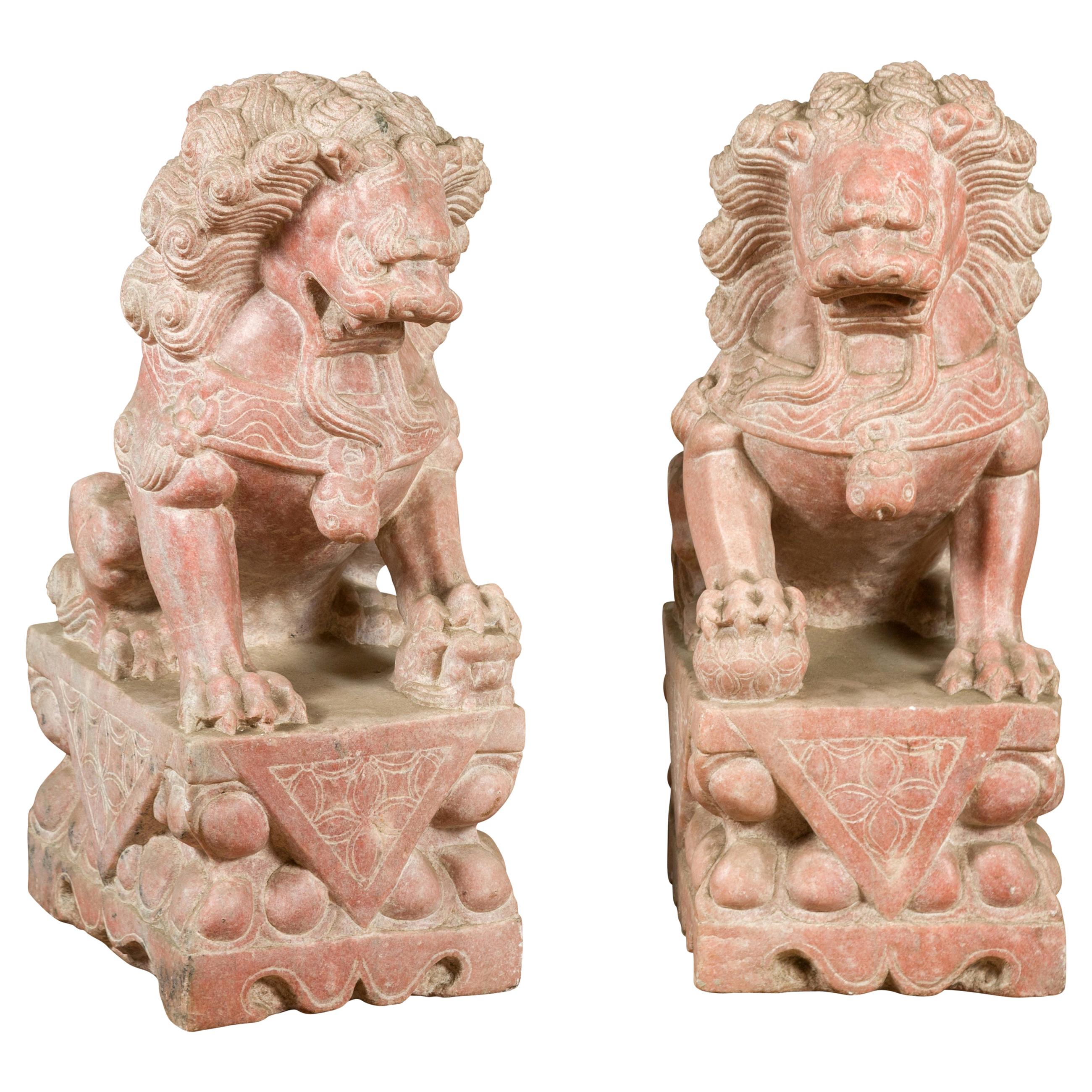 Pair of Chinese Vintage Foo Dogs Guardian Lions on Bases with Sandstone Patina For Sale