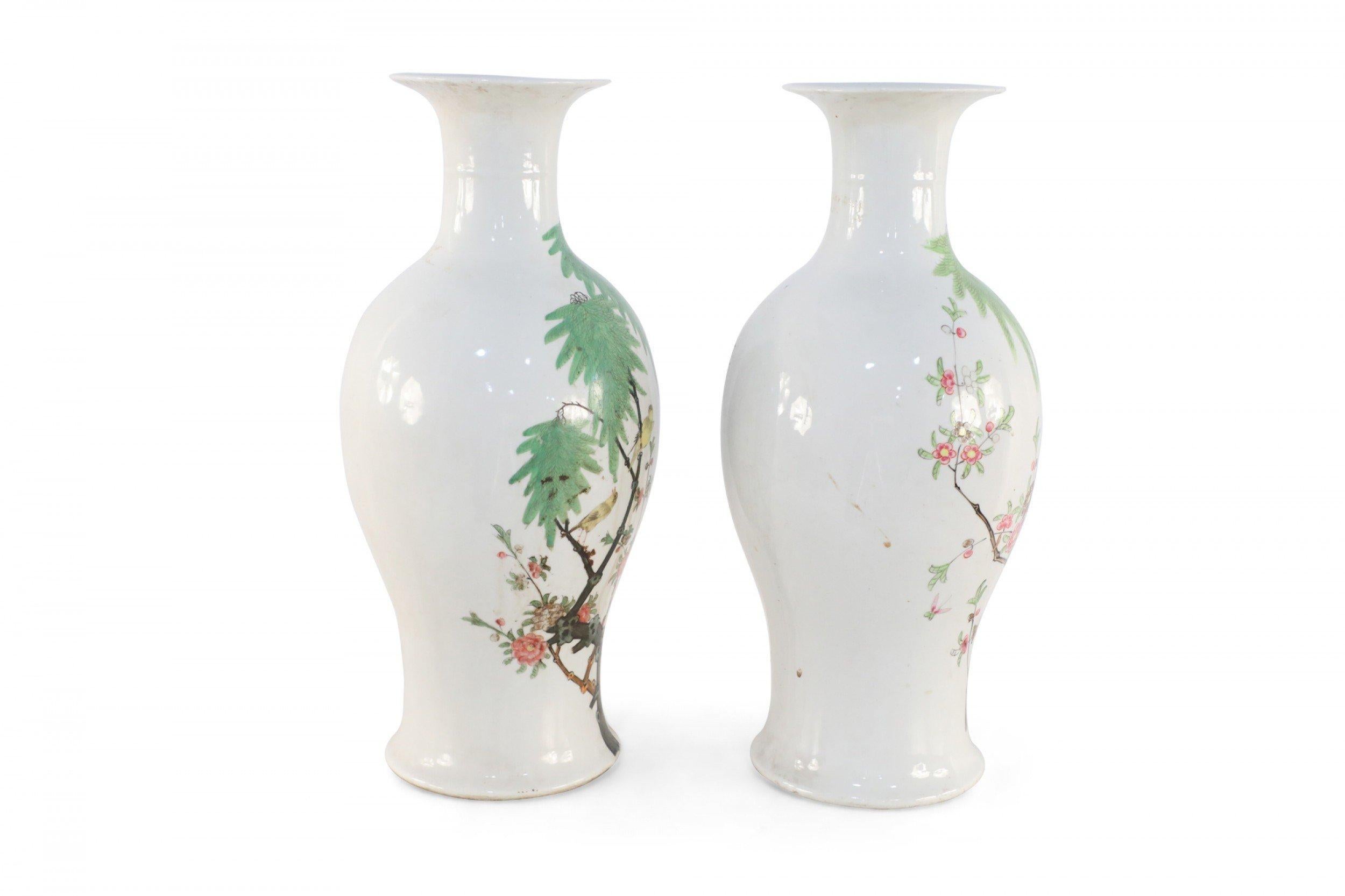 Pair of Chinese White and Cherry Blossom Branch Porcelain Urns In Good Condition For Sale In New York, NY