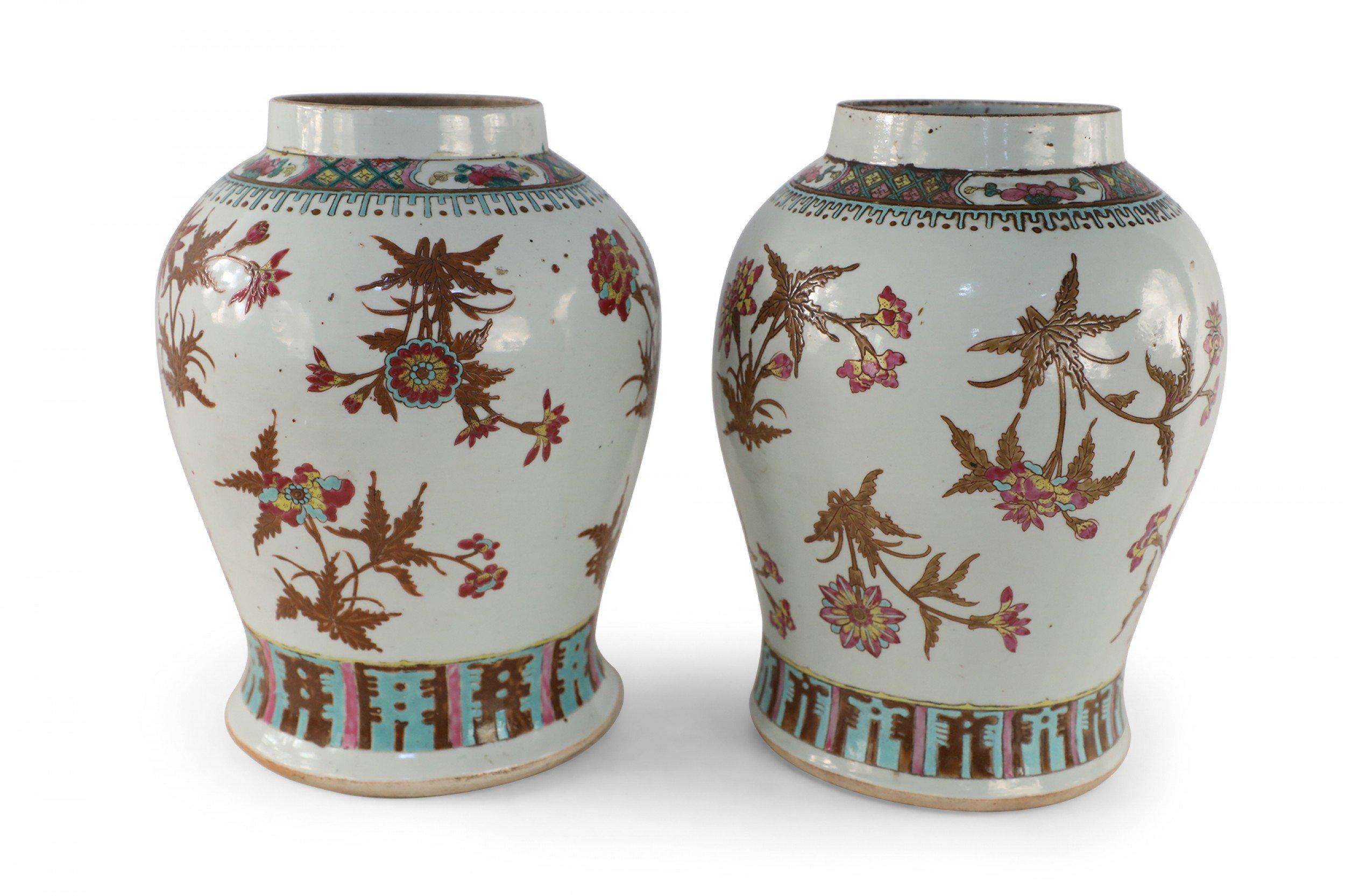 20th Century Pair of Chinese White and Maroon Floral Motif Porcelain Vases For Sale