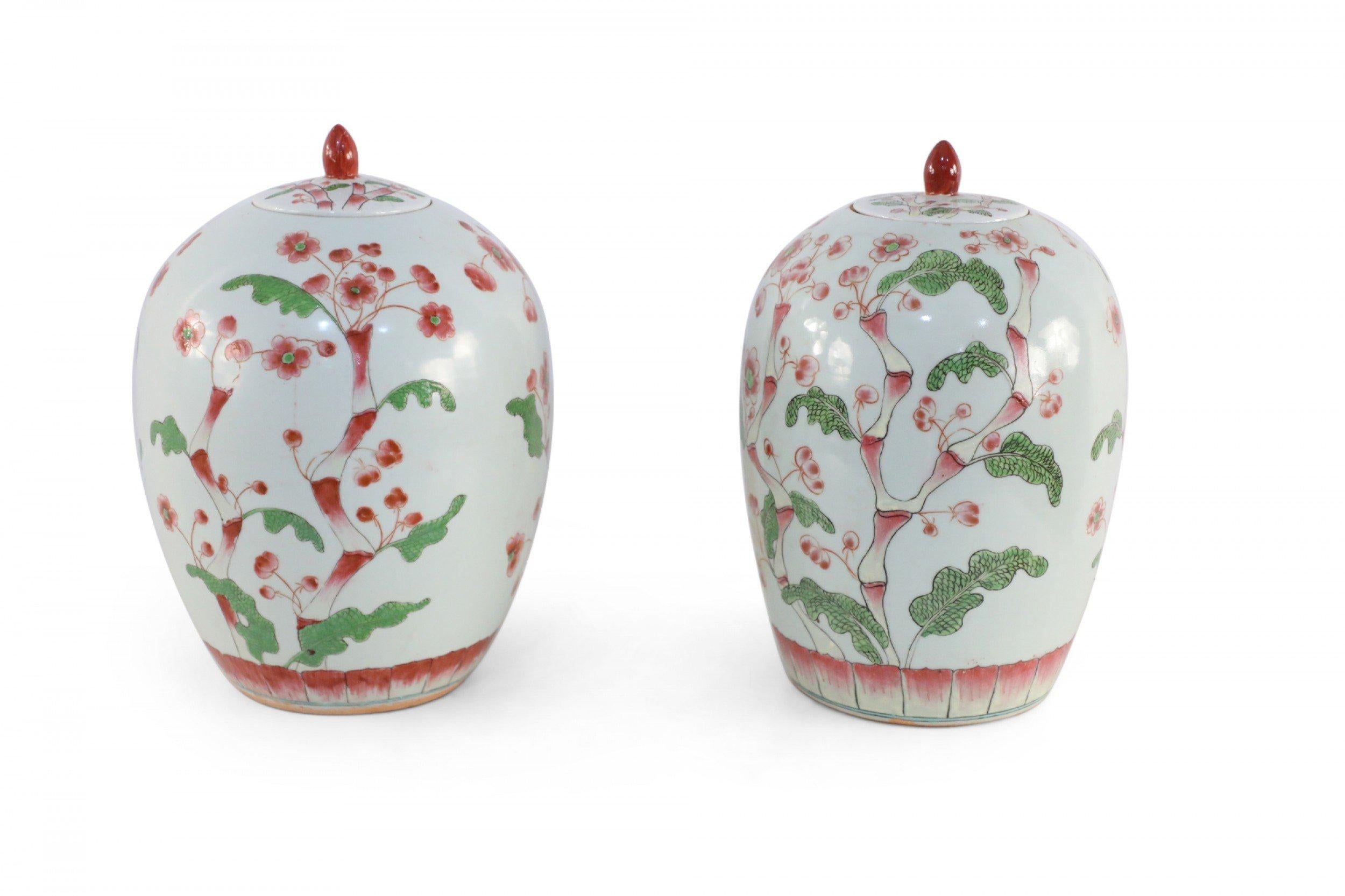 Pair of Chinese White and Pink Cherry Blossom Motif Lidded Porcelain Urns For Sale 5