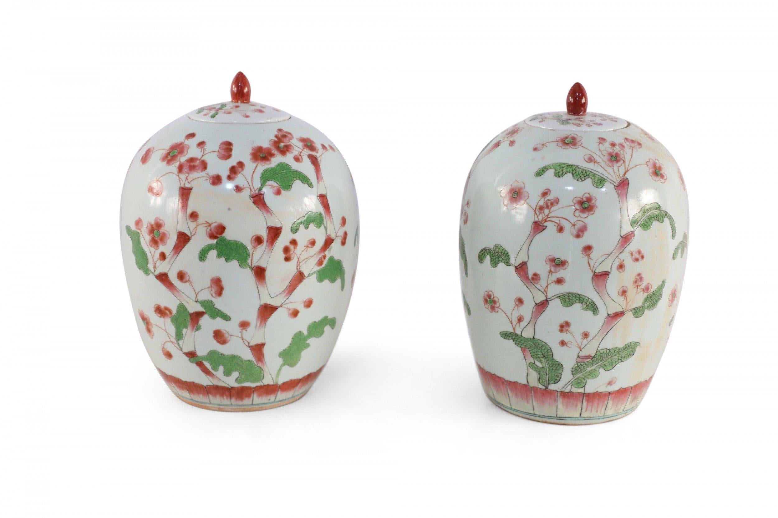 Pair of Chinese White and Pink Cherry Blossom Motif Lidded Porcelain Urns For Sale 6
