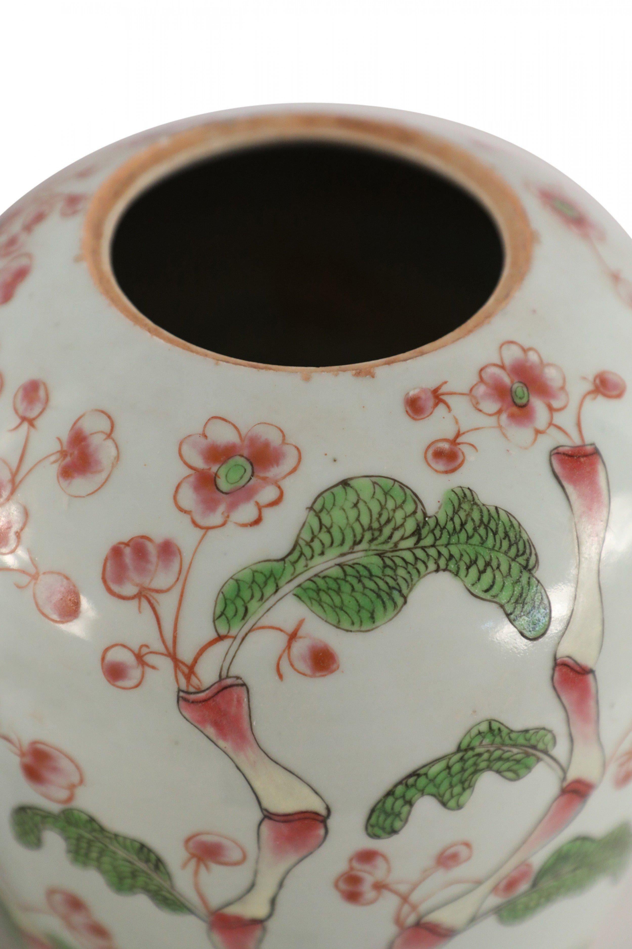 Pair of Chinese White and Pink Cherry Blossom Motif Lidded Porcelain Urns For Sale 1