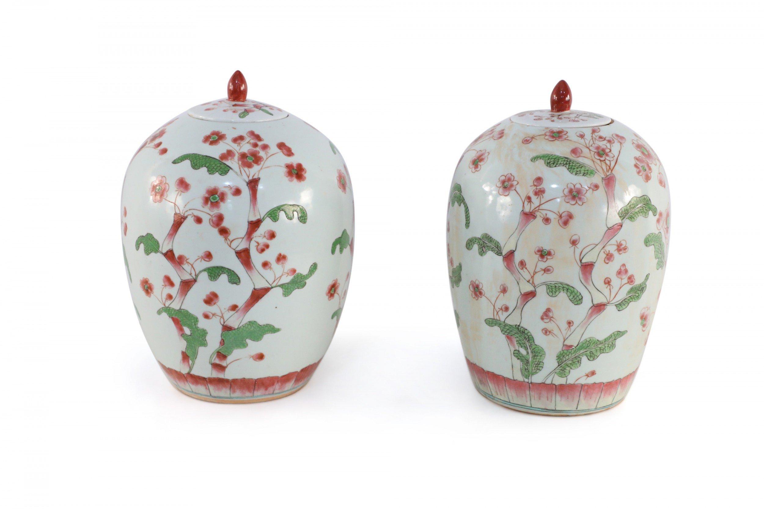 Pair of Chinese White and Pink Cherry Blossom Motif Lidded Porcelain Urns For Sale 2