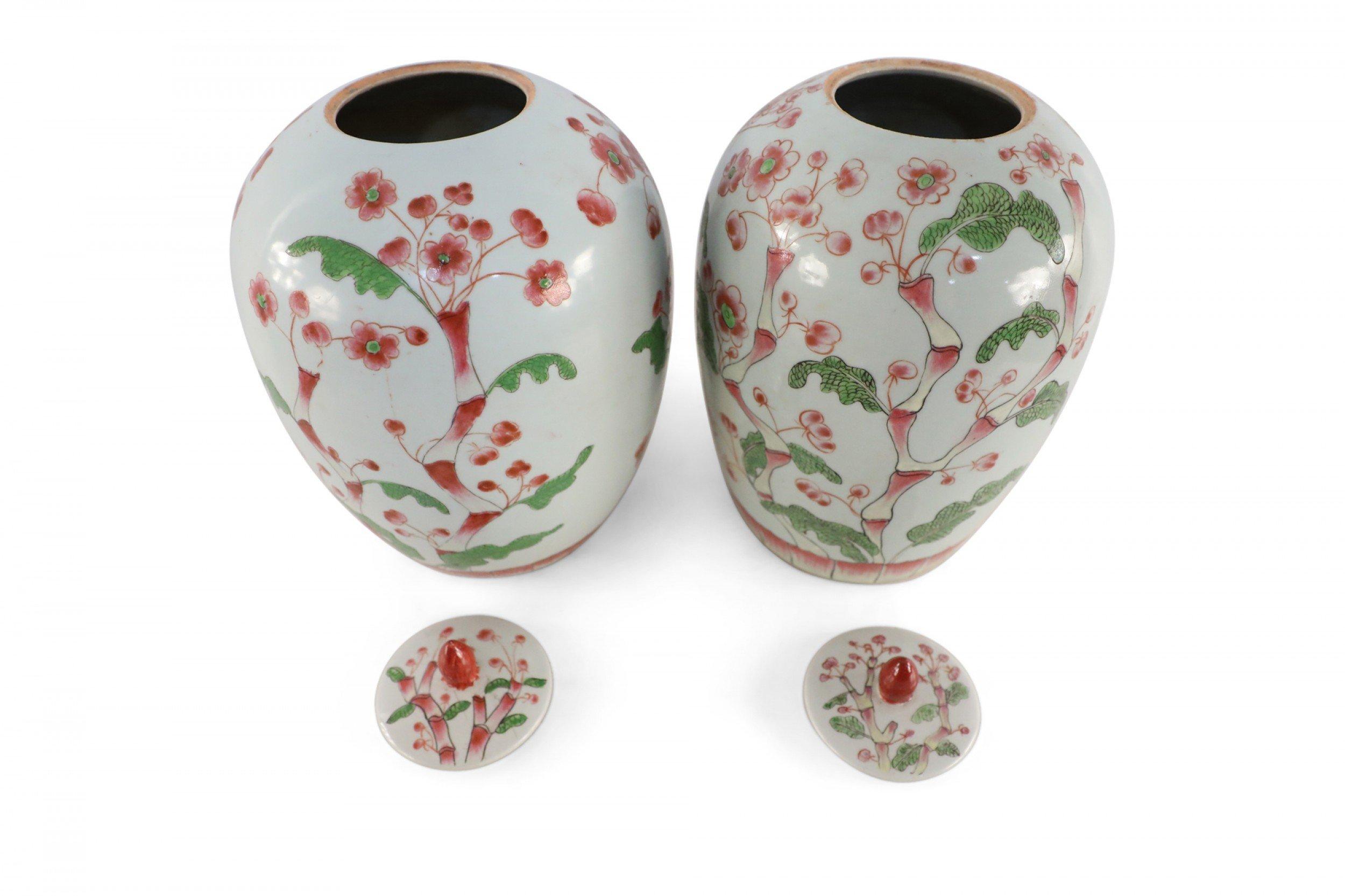 Pair of Chinese White and Pink Cherry Blossom Motif Lidded Porcelain Urns For Sale 3