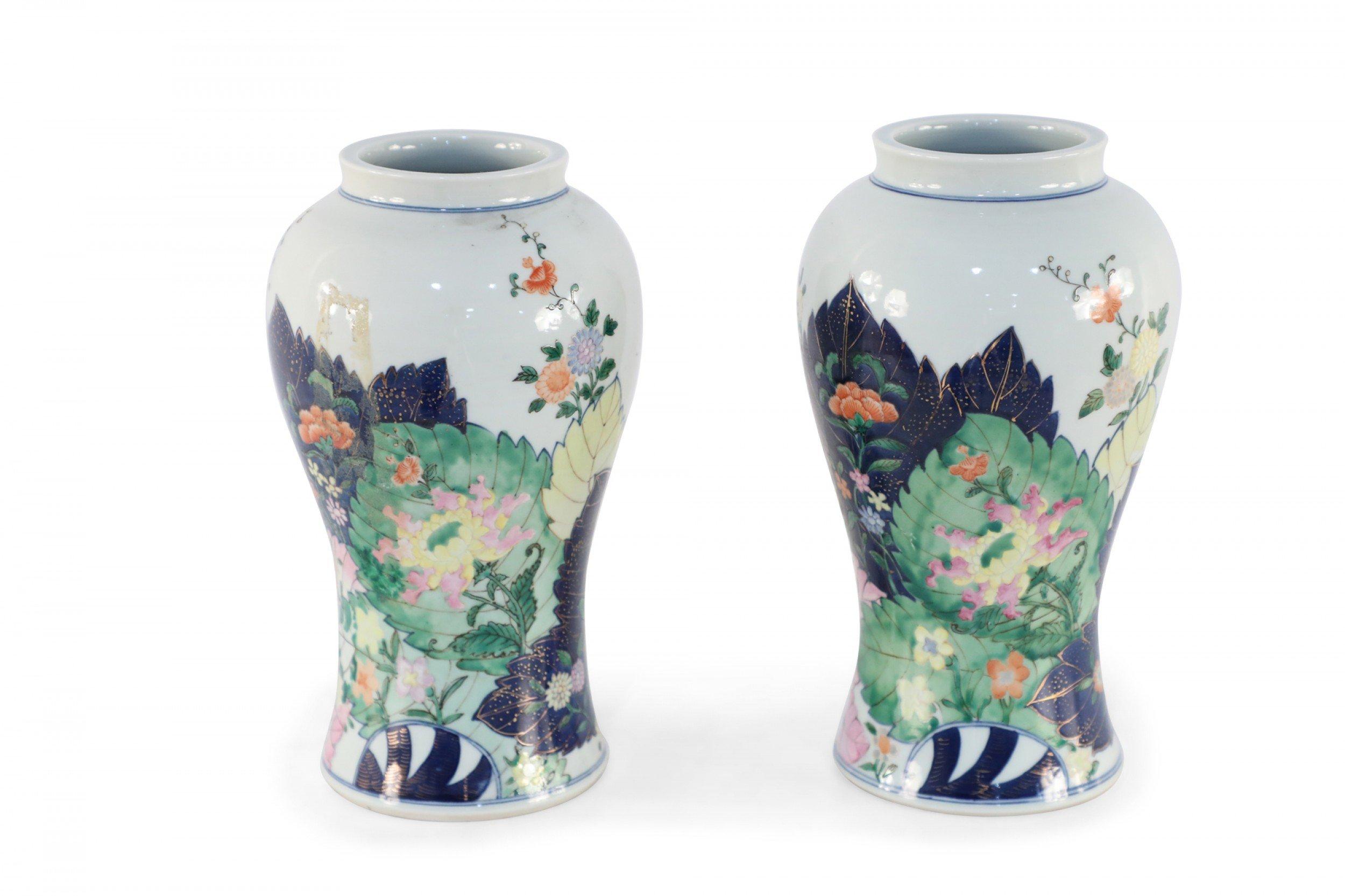 20th Century Pair of Chinese White Peacock and Floral Design Urn-Shaped Porcelain Vases For Sale