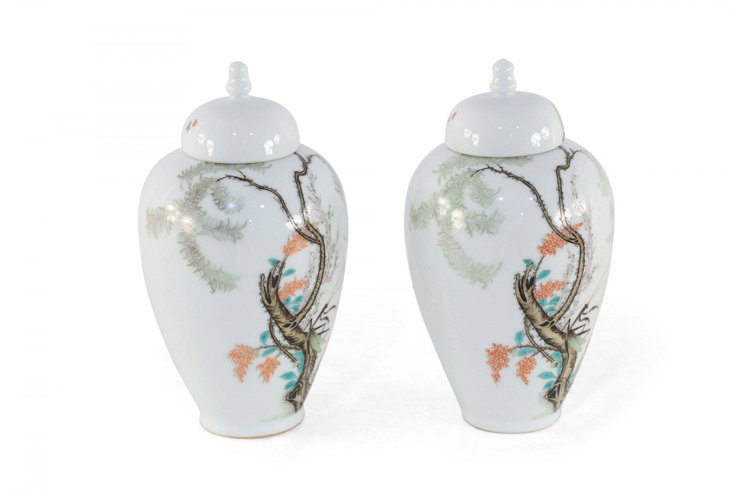 20th Century Pair of Chinese White Porcelain Famille Rose Lidded Jars For Sale
