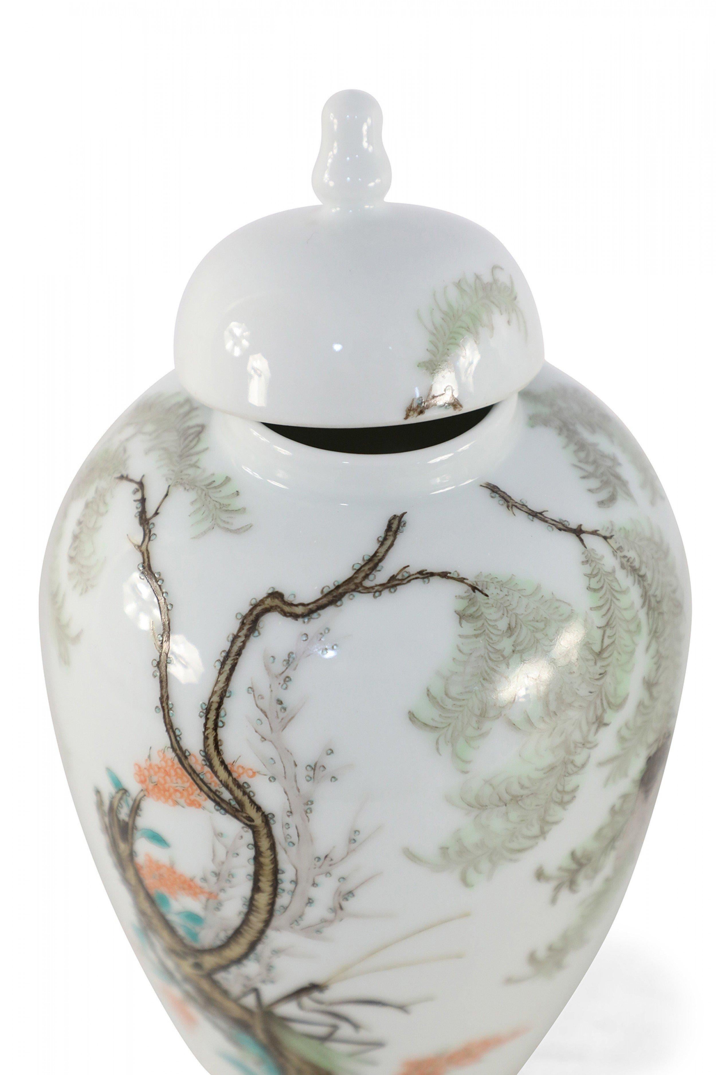 Pair of Chinese White Porcelain Famille Rose Lidded Jars 1