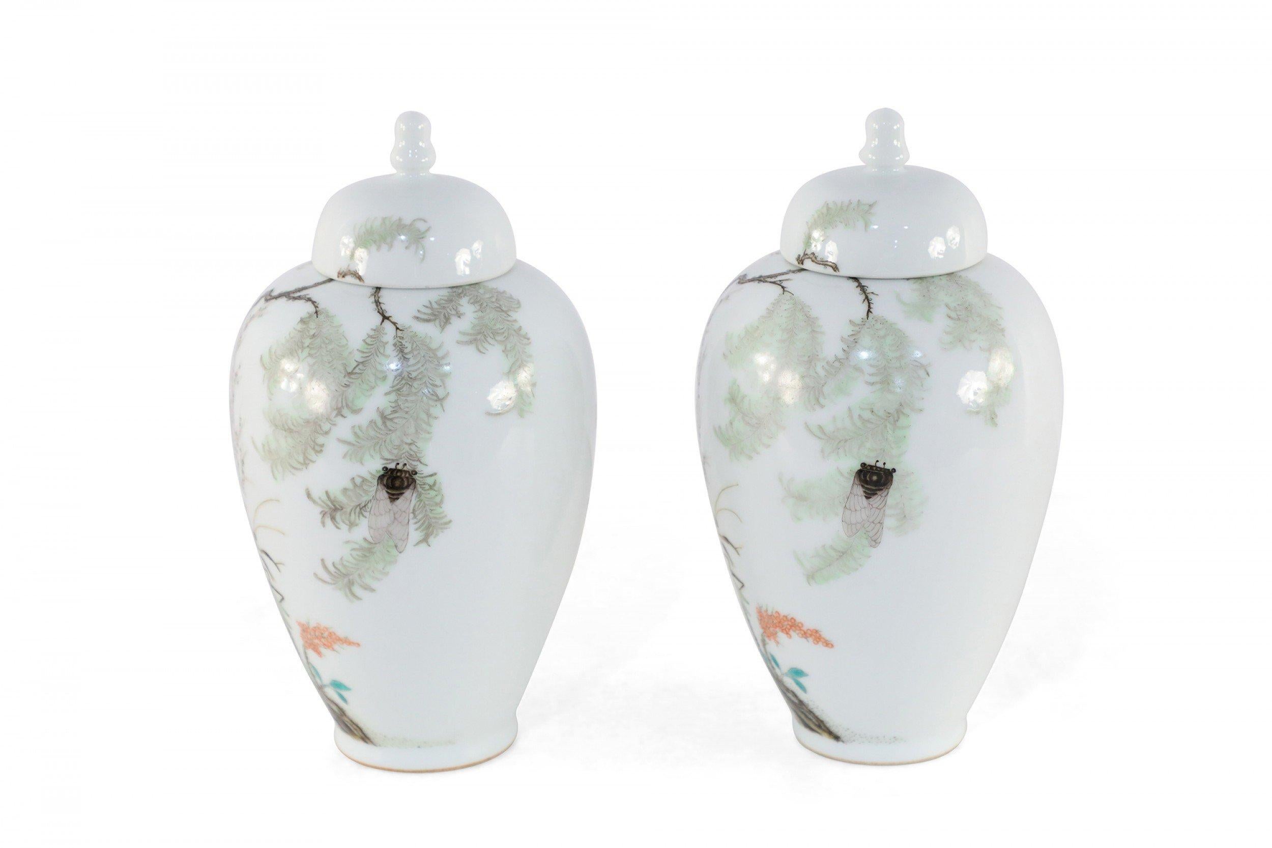 Pair of Chinese White Porcelain Famille Rose Lidded Jars For Sale 3