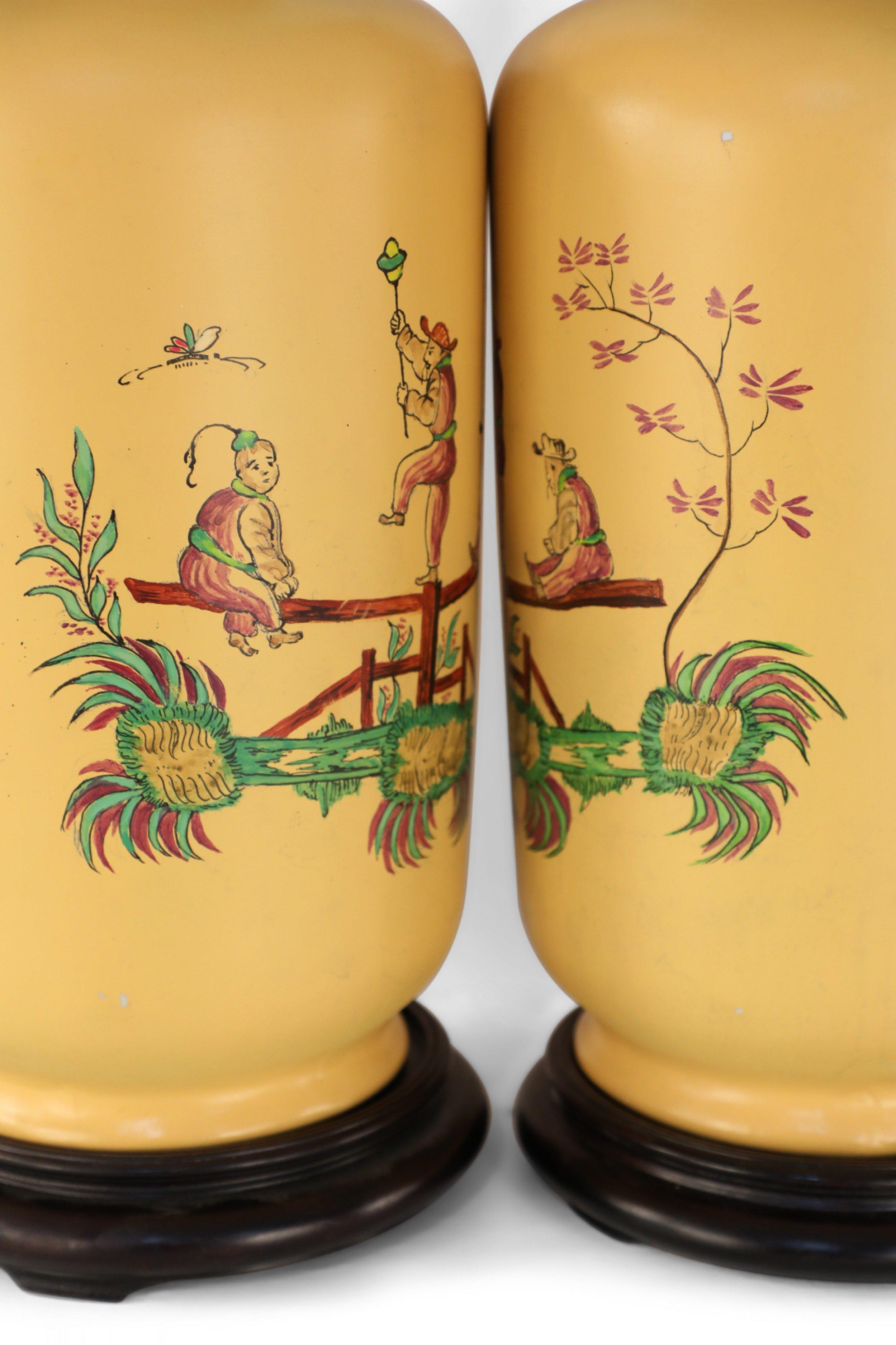 Painted Pair of Chinese Yellow Balancing Scene Table Lamps For Sale