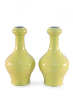 Pair of Chinese Yellow Garlic-Mouthed Porcelain Vases