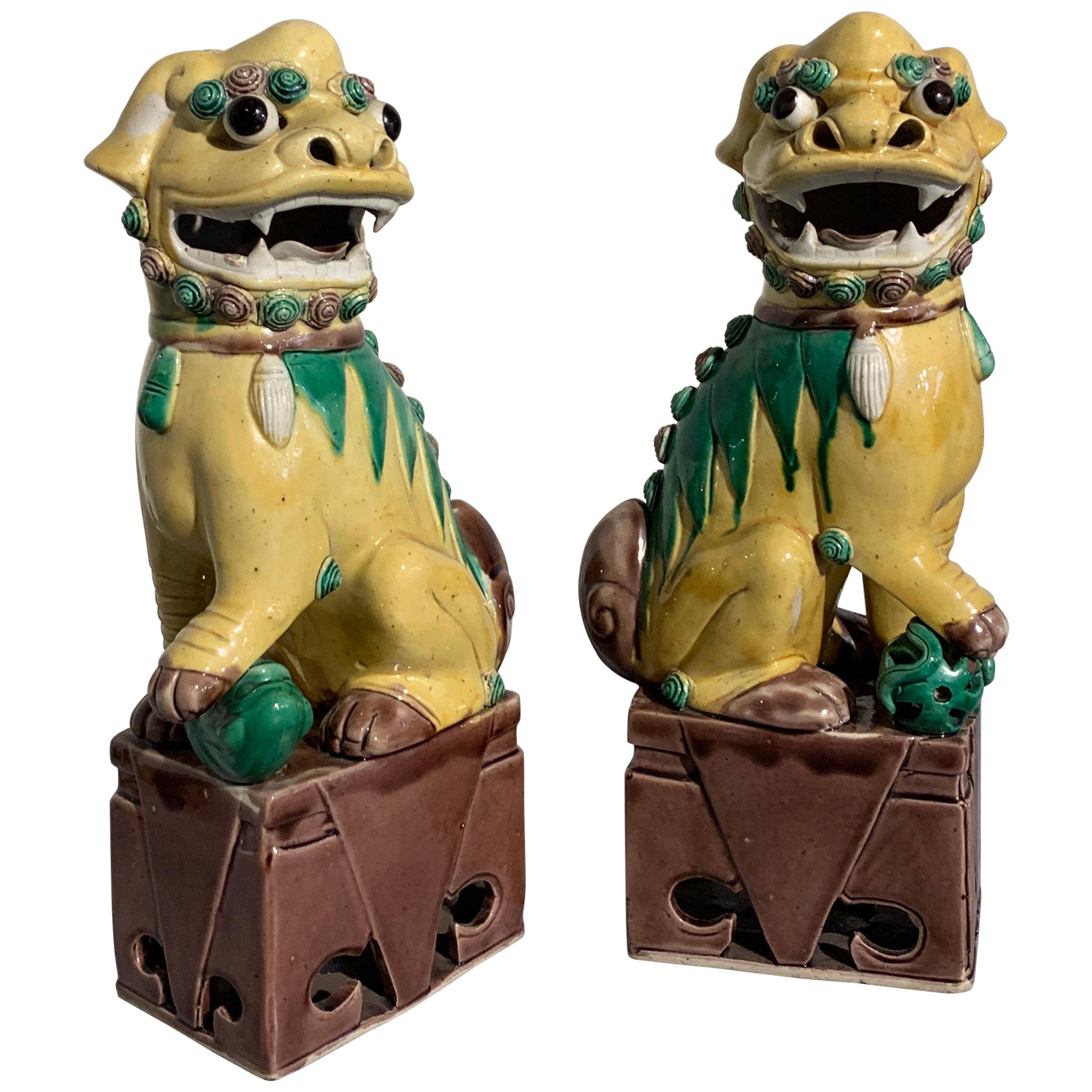 Pair of Chinese Yellow Glazed Porcelain Foo Dogs, circa 1930s