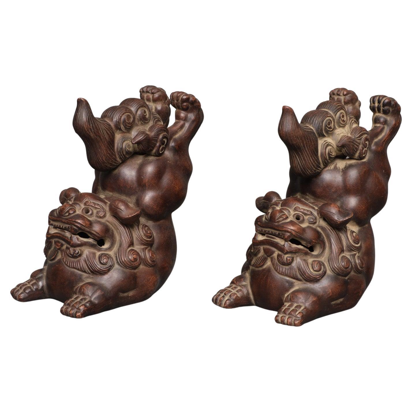 Pair of Chinese Yixing Ware Figures of Temple Lions, by the Artist Li Jun