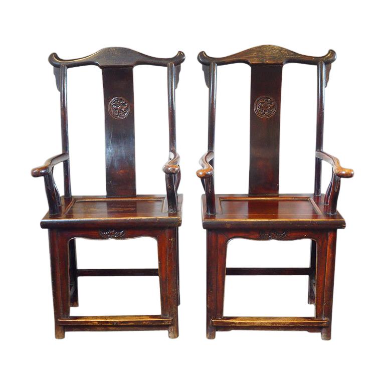 Pair of Chinese yoke back armchairs