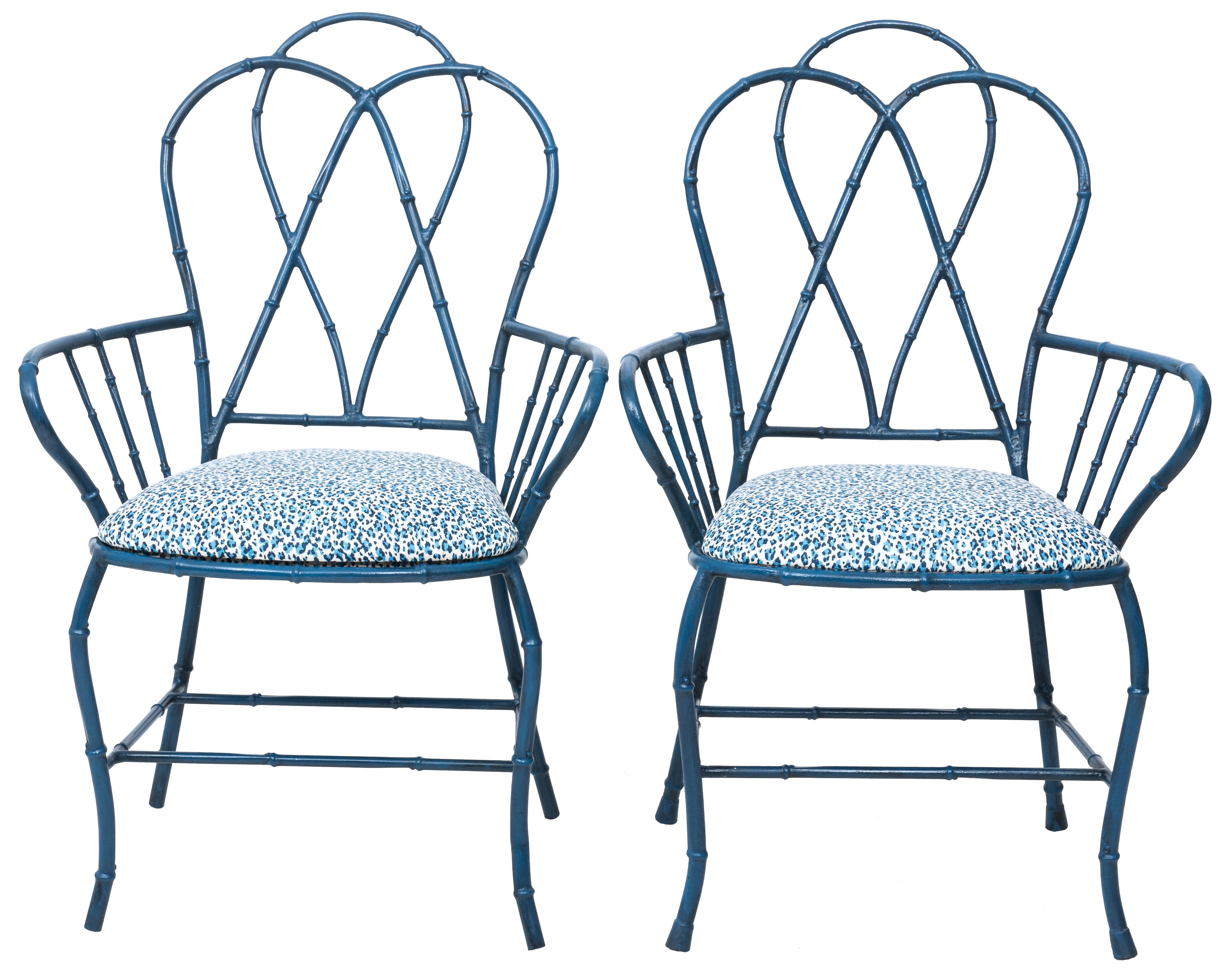 Pair of curvy bamboo-style metal armchairs newly painted in a custom medium blue finish. Newly upholstered in Quadrille Bonaparte leopard fabric.