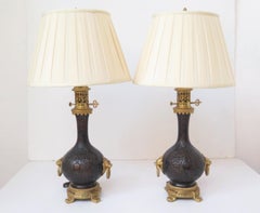 Pair of Chinoiserie Bronzed Metal Electrified Oil Lamps