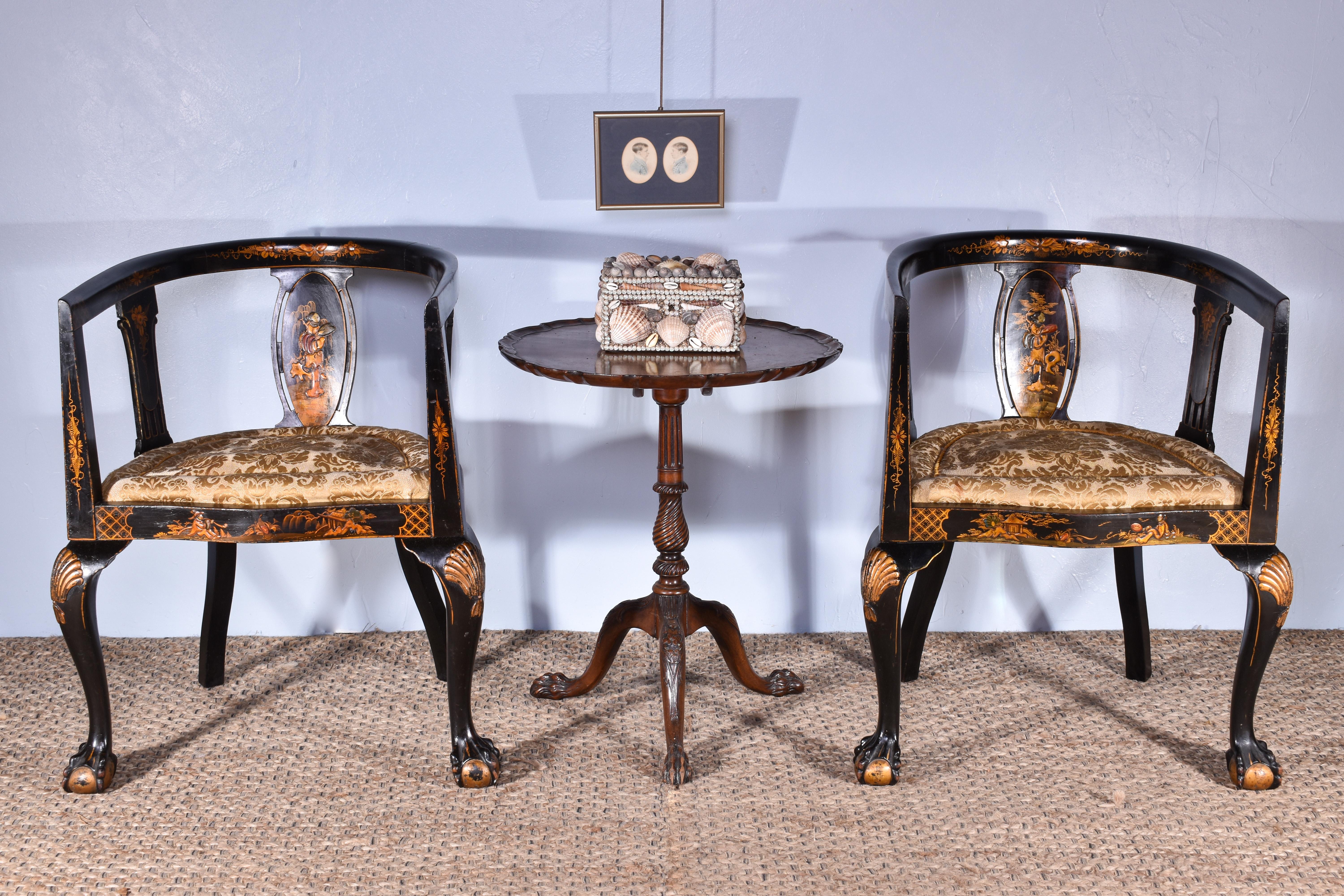 A matched pair of chinoiserie decorated tub chairs, C.1920.

Both chairs retaining their ‘Percy Young of London’ retailers labels.

The original traditionally upholstered drop in seat pads are useable, however could benefit from re-upholstery.