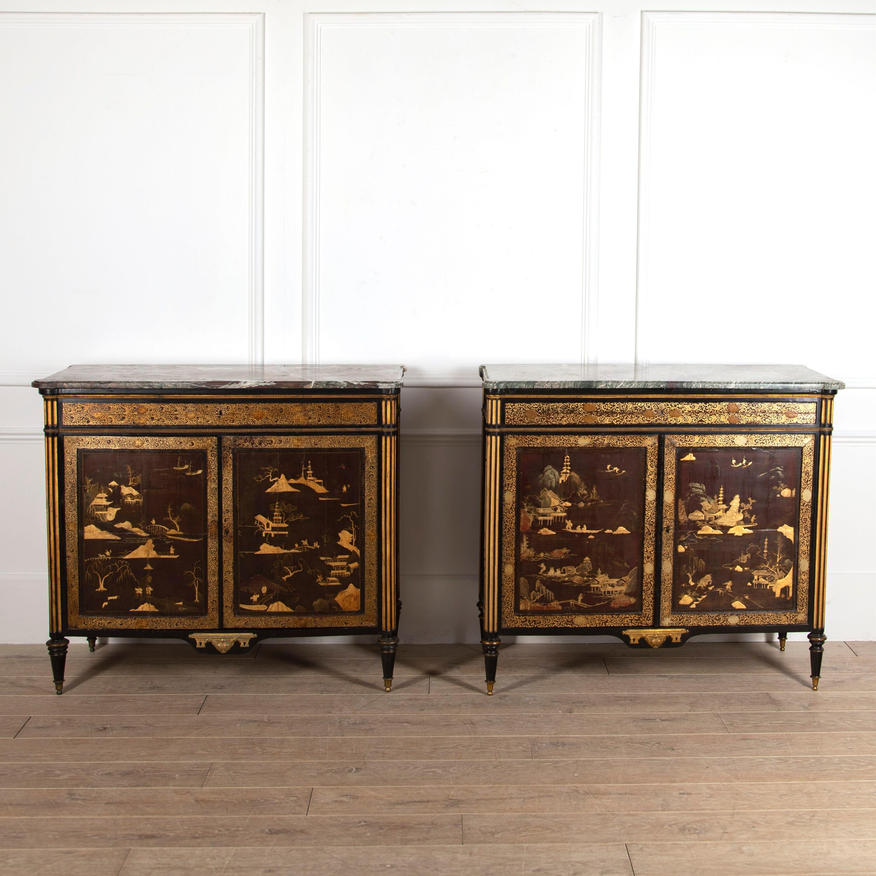 An exceptional pair of French Directoire period cabinets profusely decorated with Chinoiserie lacquer.

Each buffet has been constructed from the panels of an early 18th Century Chinese lacquered screen with the interiors charmingly showing the