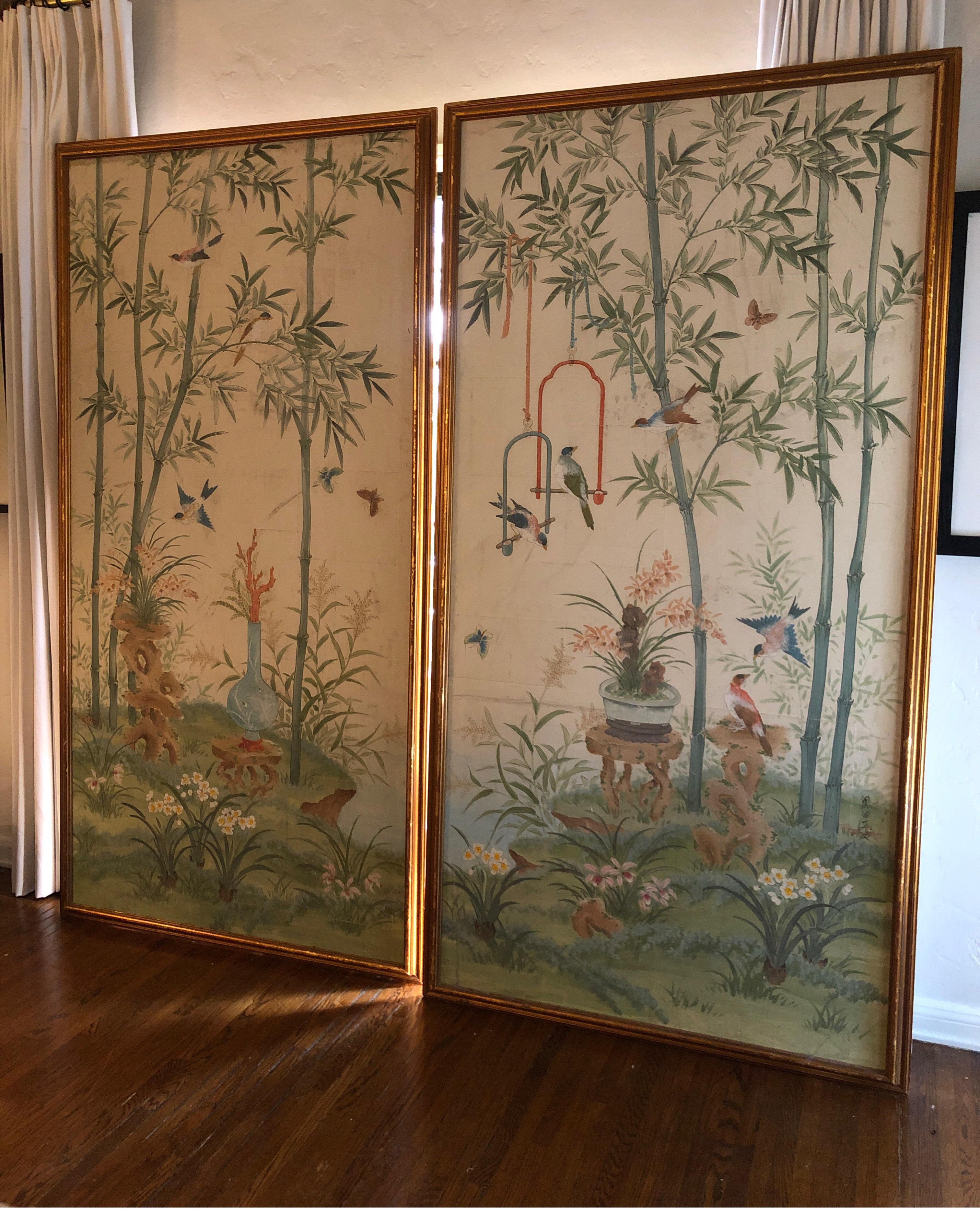 Gorgeous pair large scale hand painted chinoiserie panels by Robert Crowder (1911-2010).
Each panel has detailed birds, flowers, leaves and butterflies. 

Each panel has a gilt gold frame.
