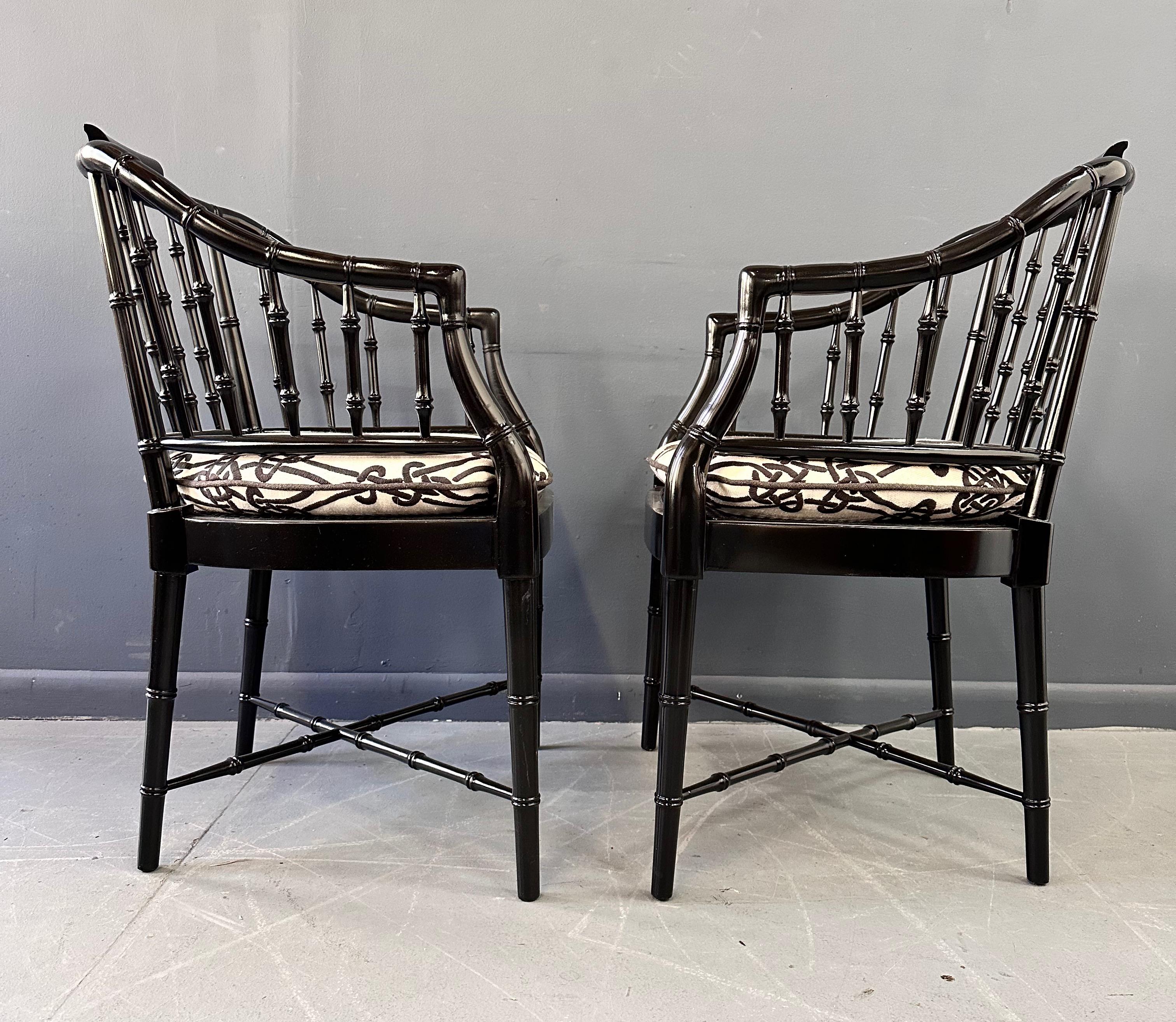 A Classic looking Asian styled chair produced by Baker Furniture in the 1960s. These feature, black lacquered solid wood construction with custom sewed cushions. Clean and ready for use.
