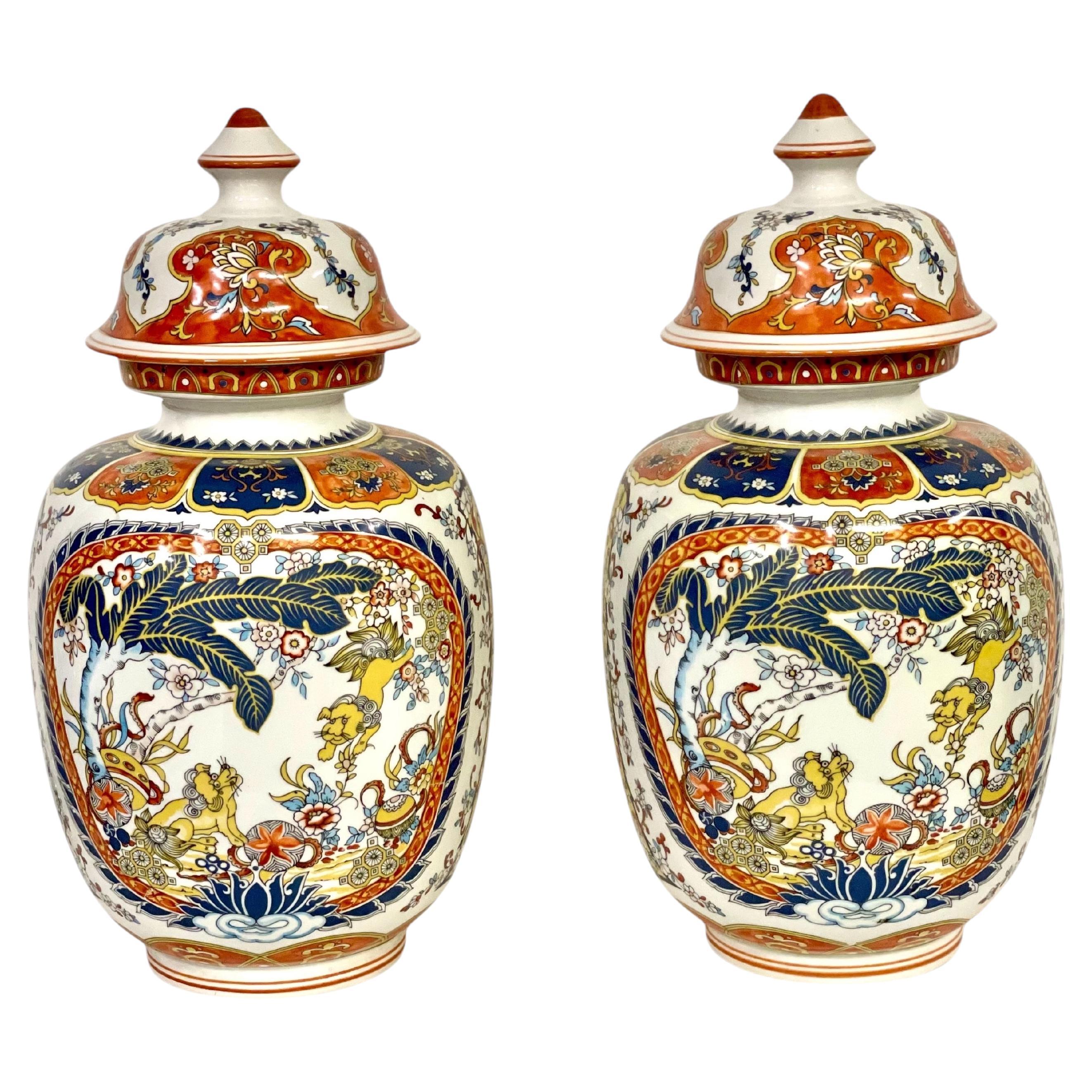 Pair of Chinese Polychrome Porcelain Lidded Vases
